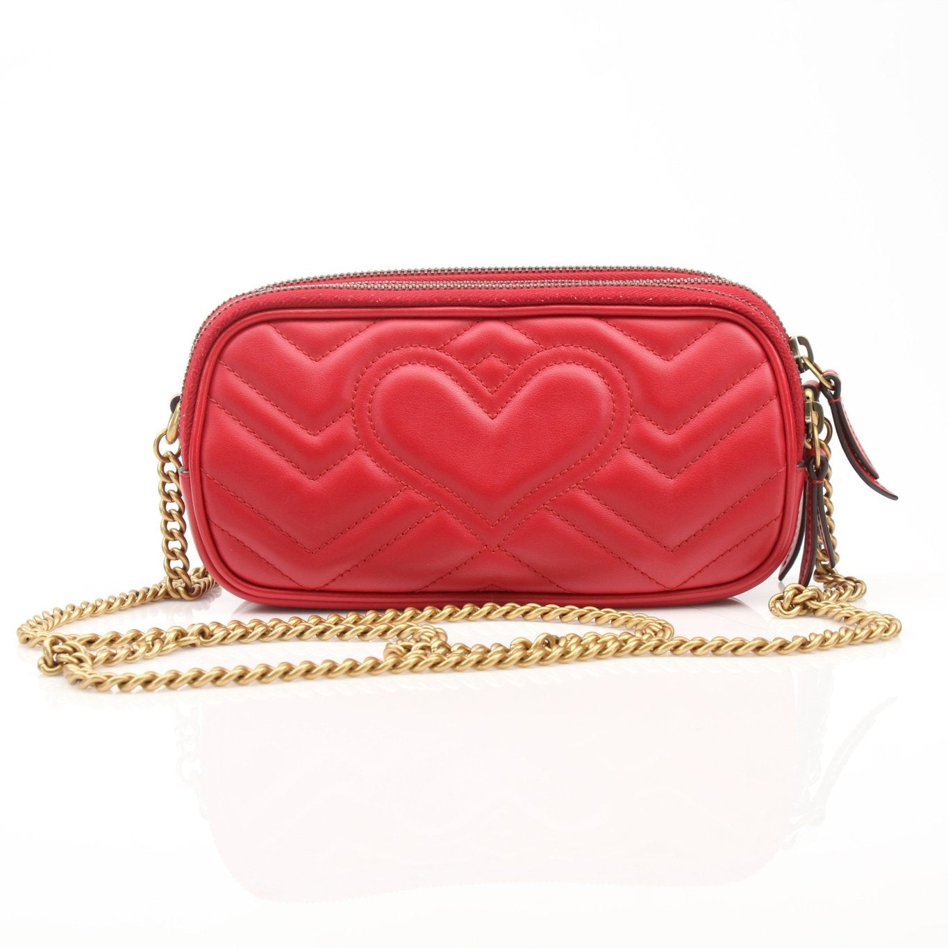 Gold & Beyond Gucci GG Marmont Matelassé Mini Shoulder Bag handbag with quilted leather and gold hardware.