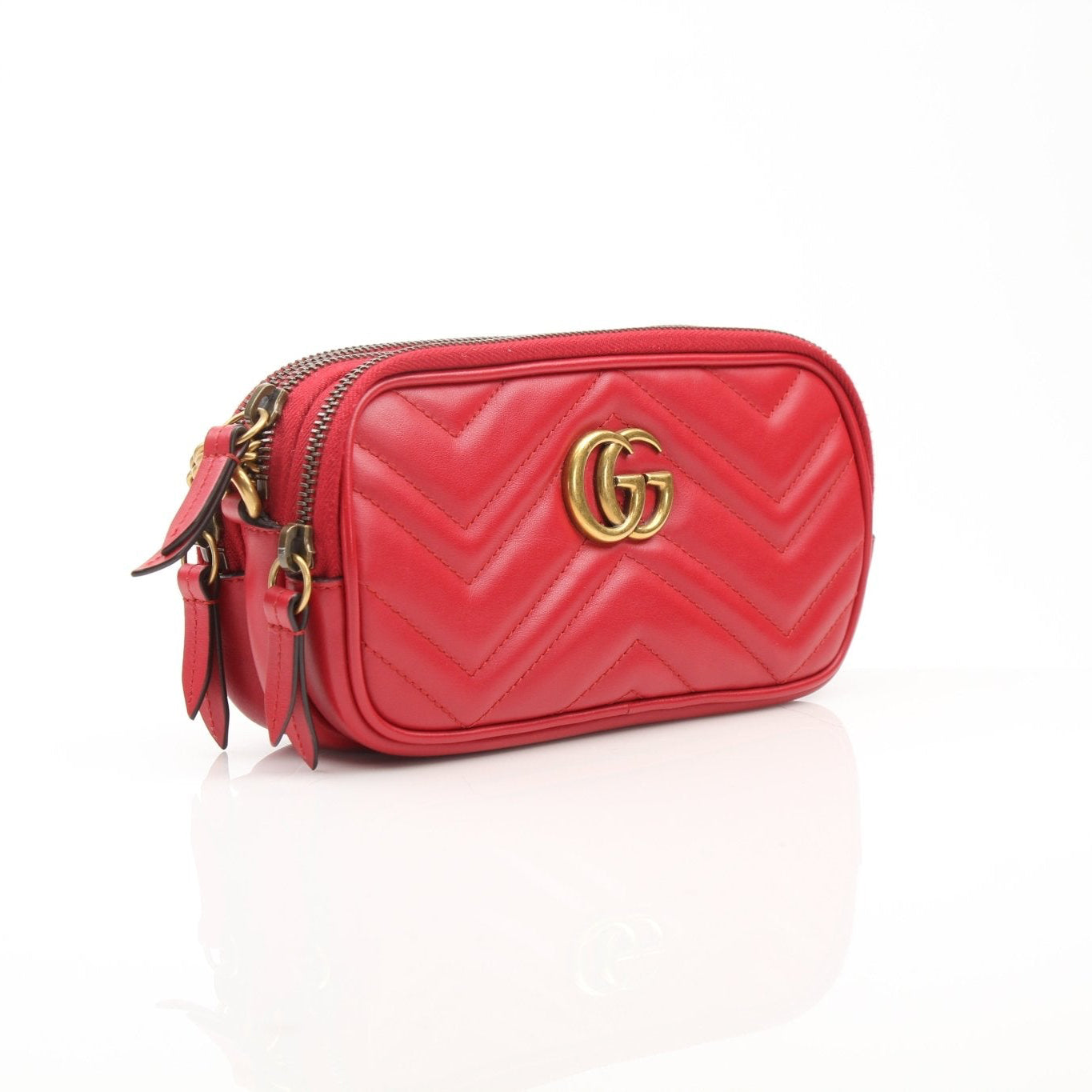 Gold & Beyond Gucci GG Marmont Mini Shoulder Bag, black matelassé leather handbag with gold hardware and chevron stitching.