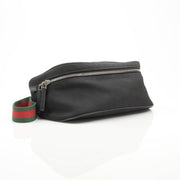 Gucci Techno Web Canvas waist bag with adjustable strap and gold-tone hardware, designed for stylish convenience.