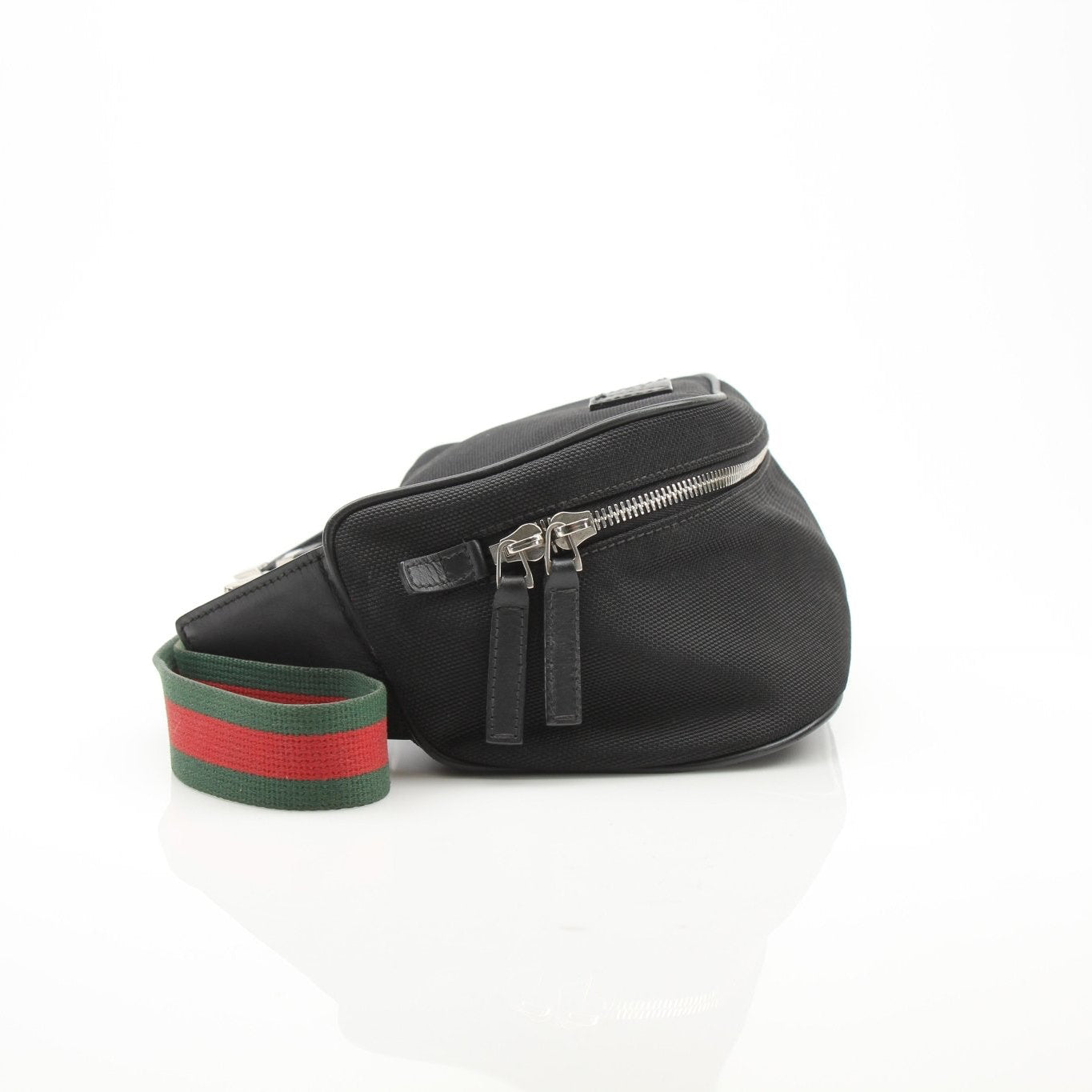 Gucci Techno Web Canvas waist bag with adjustable strap and gold-tone hardware, stylish handbag for casual and everyday use.
