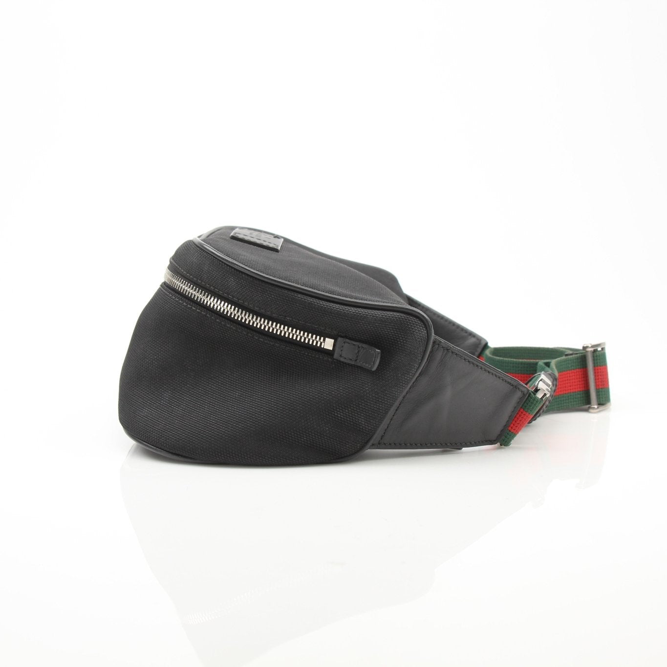 Gucci Techno Web Canvas Waist Bag, a stylish handbag with a web design, displayed on a neutral background.