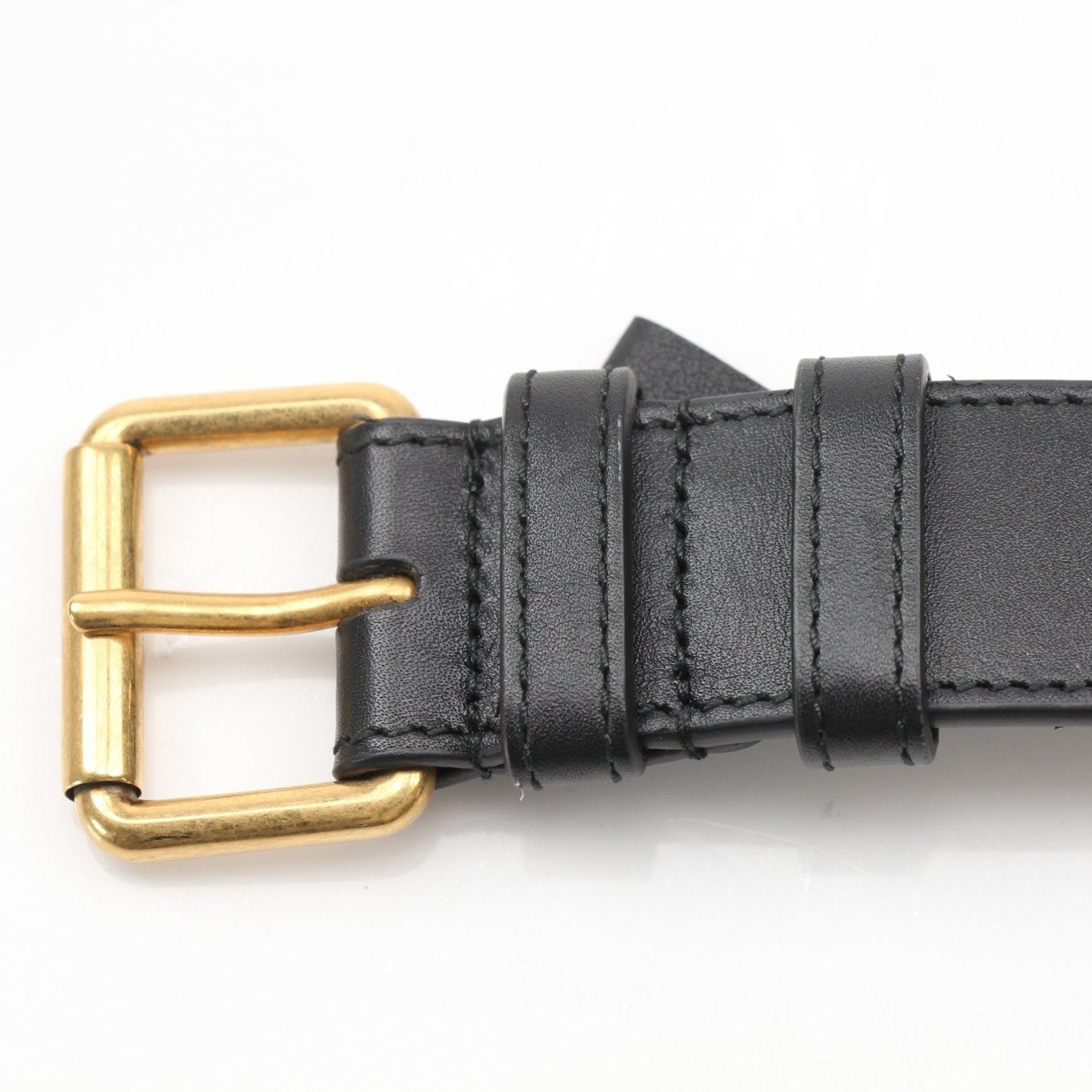 Gucci GG Marmont Matelassé Belt Bag, gold quilted handbag with chain strap and GG logo detail.