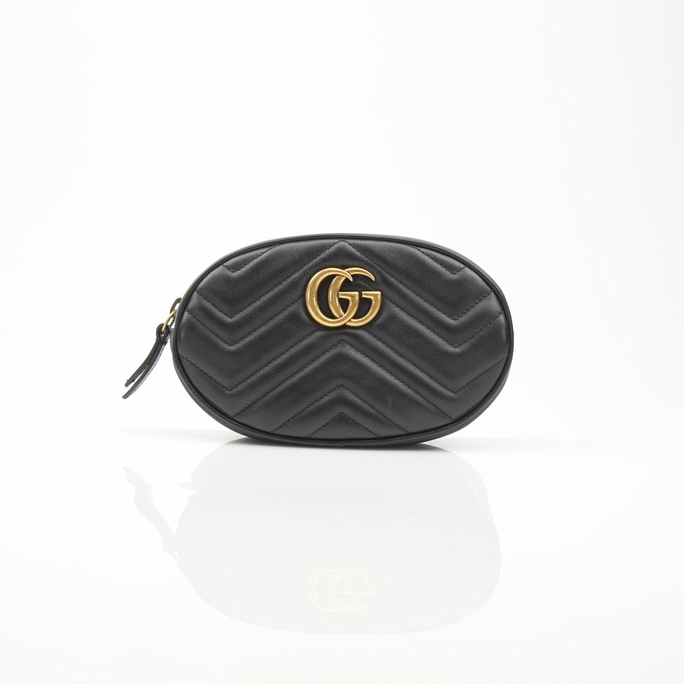 Gold & Beyond Gucci GG Marmont Matelassé Belt Bag handbag with quilted design and gold-tone hardware, shown on a neutral background.