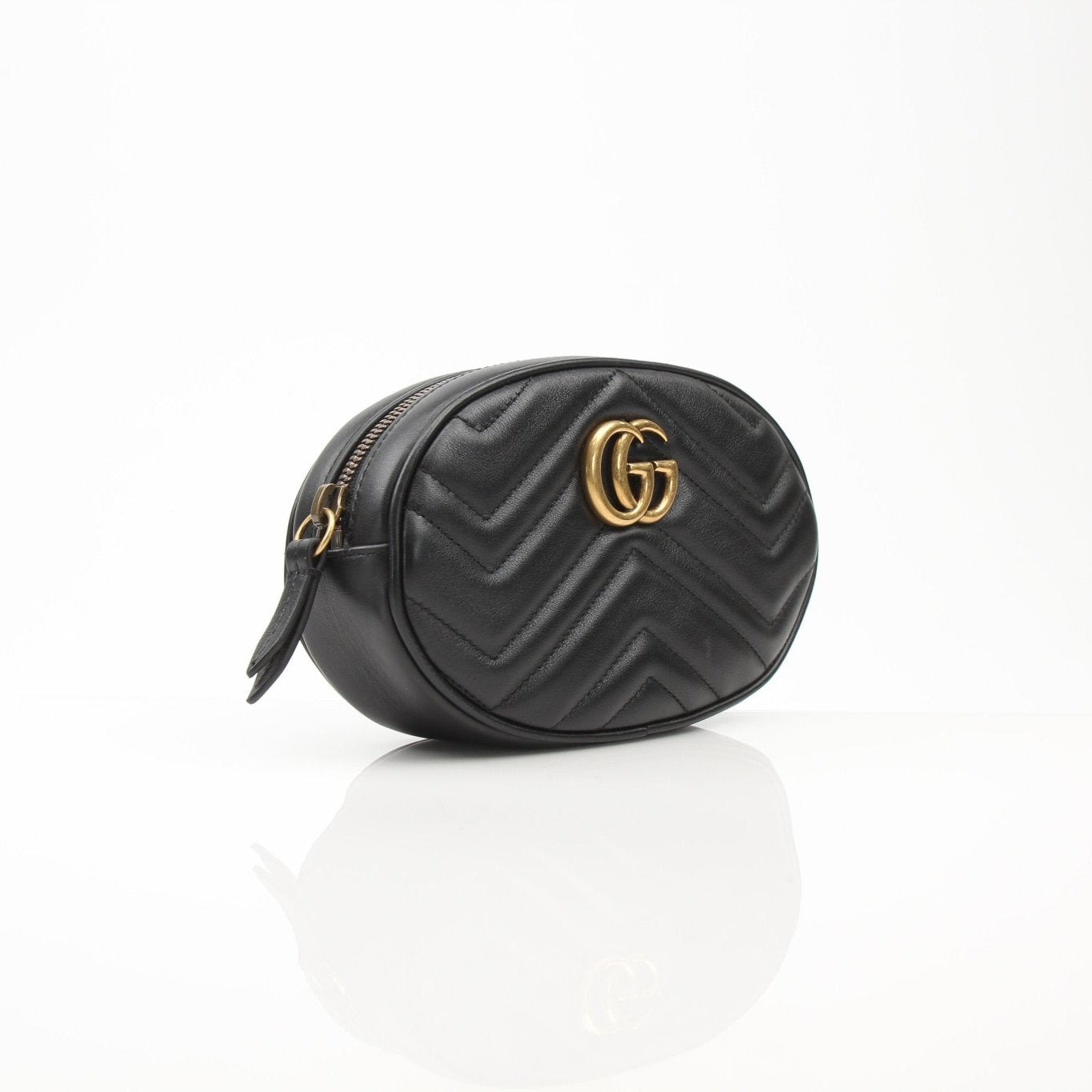 Gold & Beyond Gucci GG Marmont Matelassé belt bag featuring quilted leather and gold-tone hardware.