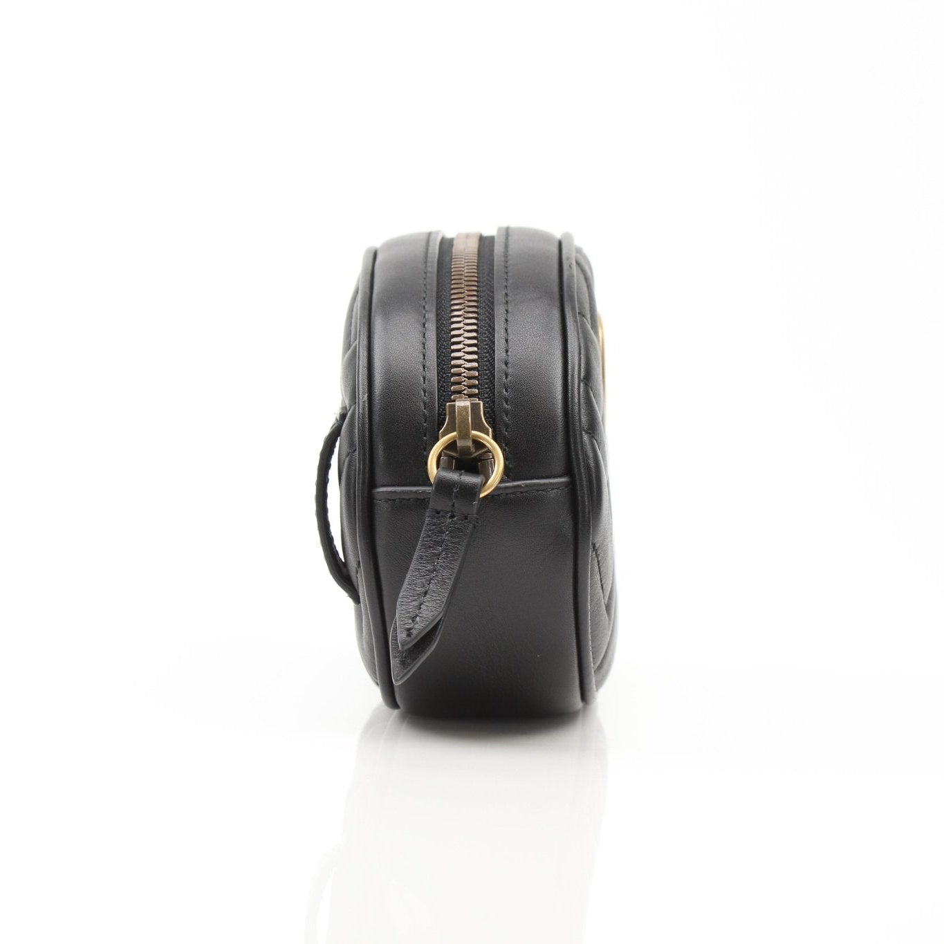 Gucci GG Marmont Matelassé Belt Bag handbag with quilted design and gold hardware, featuring the iconic GG logo.