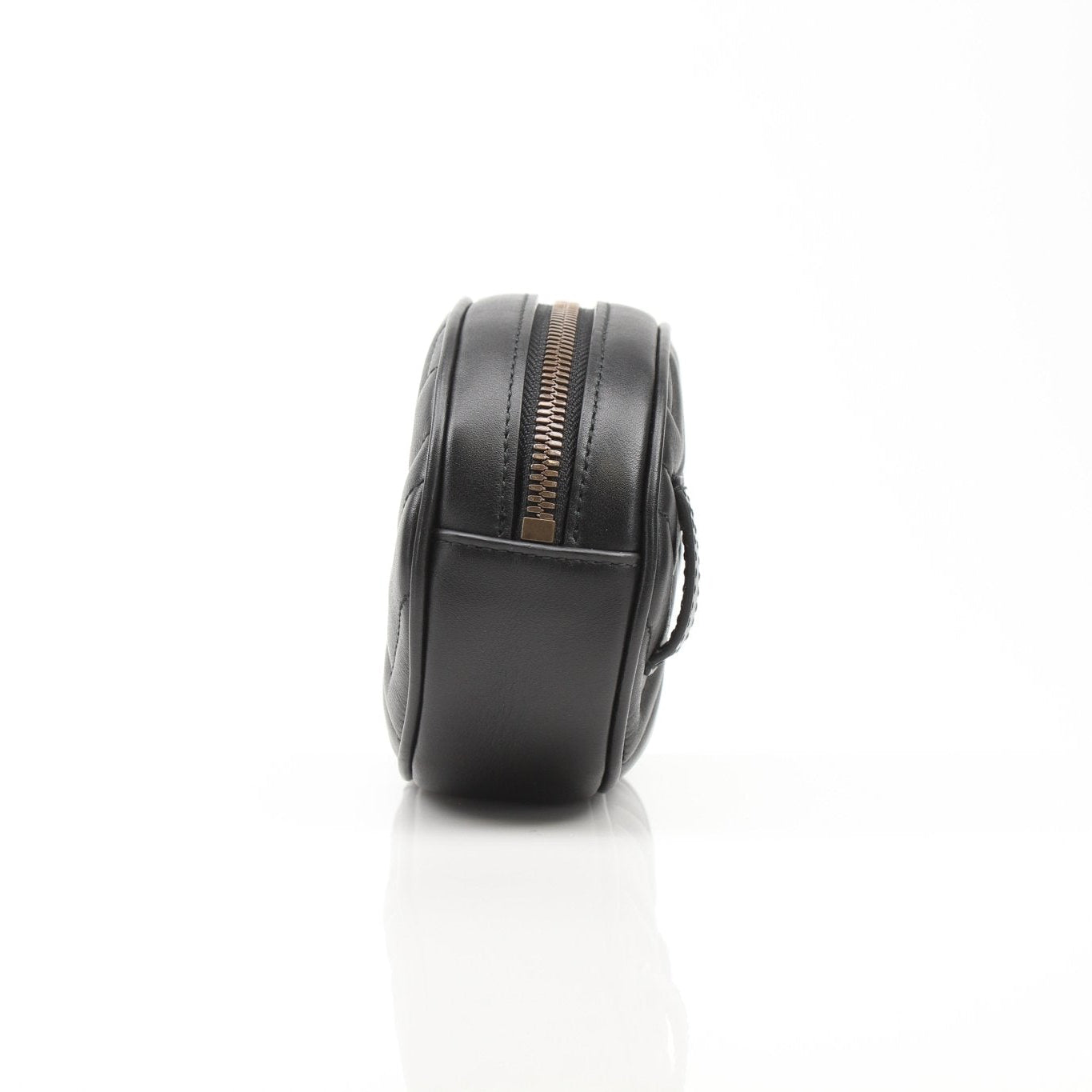 Gucci GG Marmont Matelassé Belt Bag handbag with quilted design and gold hardware, displayed on a neutral background.