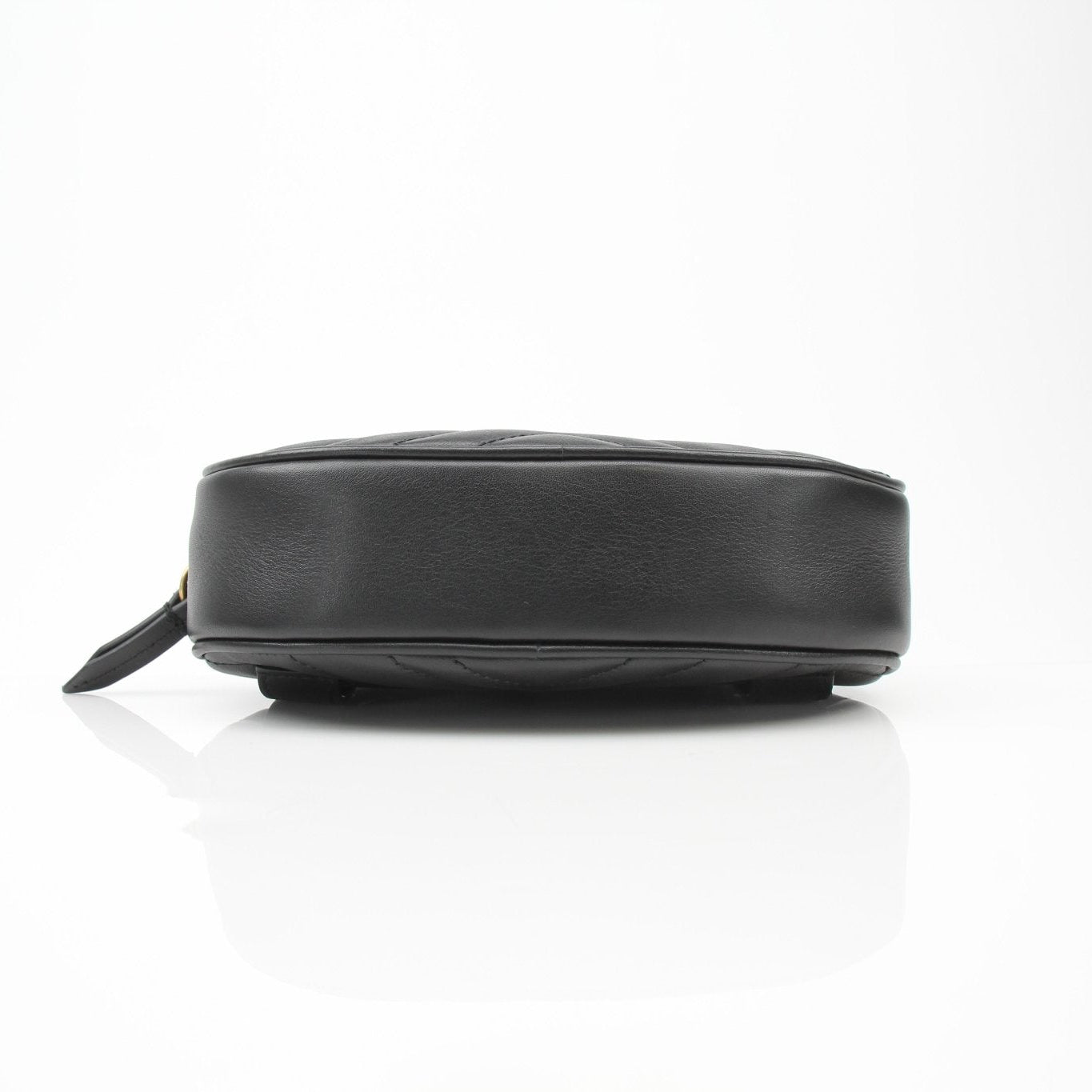 Gucci GG Marmont Matelassé Belt Bag handbag with quilted design and gold hardware, featuring the signature GG logo.