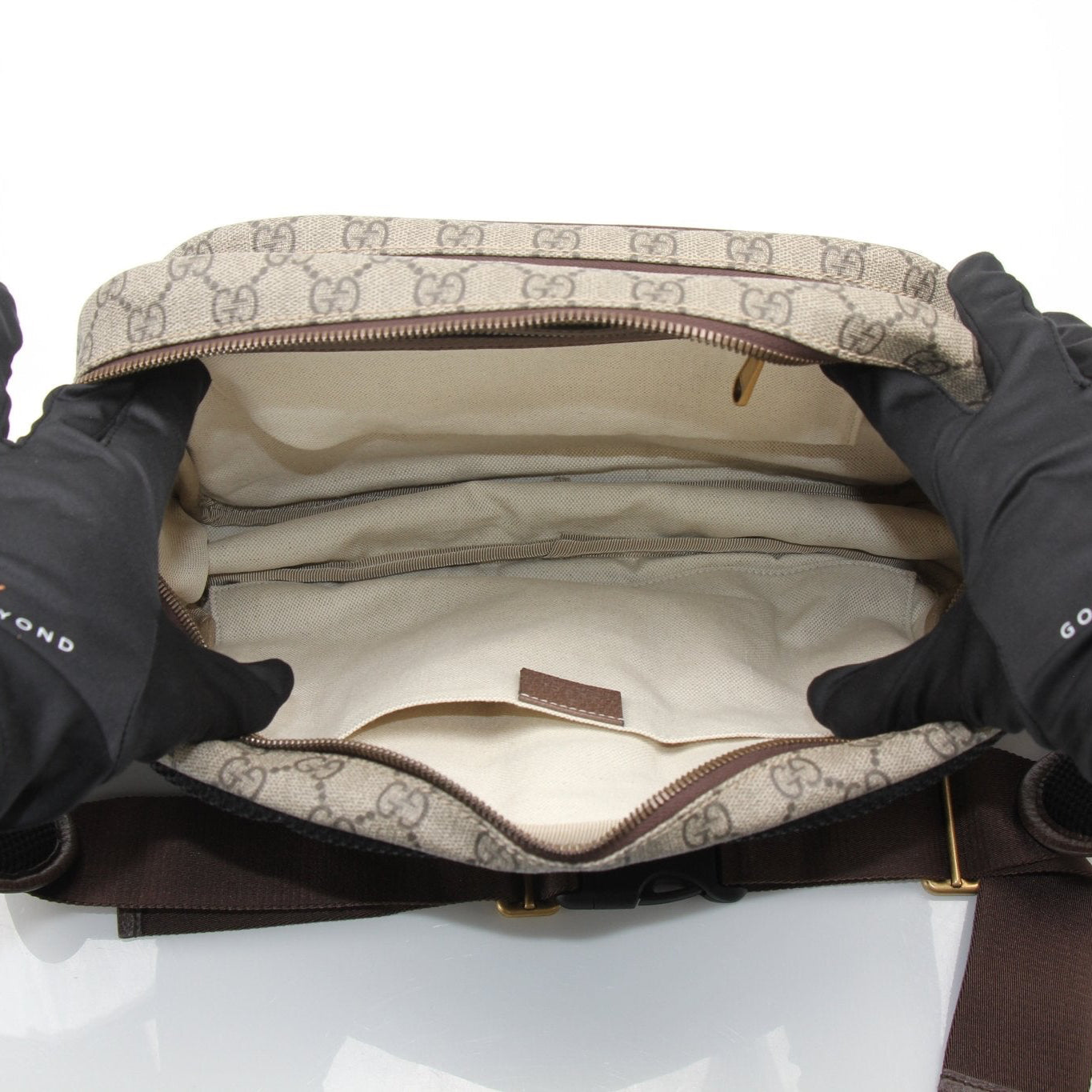 Gucci GG Ophidia belt bag, luxury handbag with signature pattern and gold accents, stylish accessory for casual or dressy outfits.