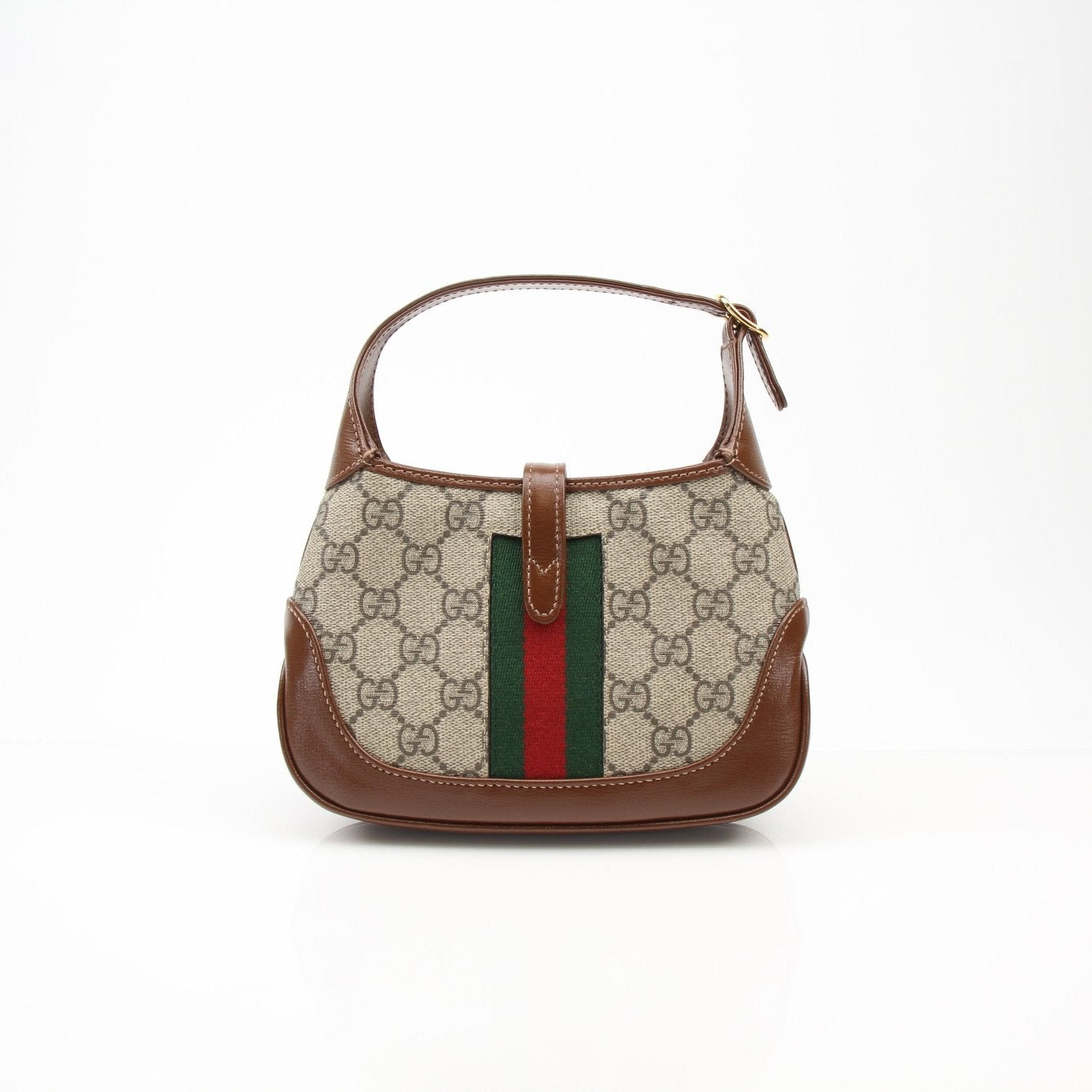 Gucci 1961 Mini Jackie GG shoulder handbag in beige canvas with leather trim and gold hardware, displayed on a neutral background.
