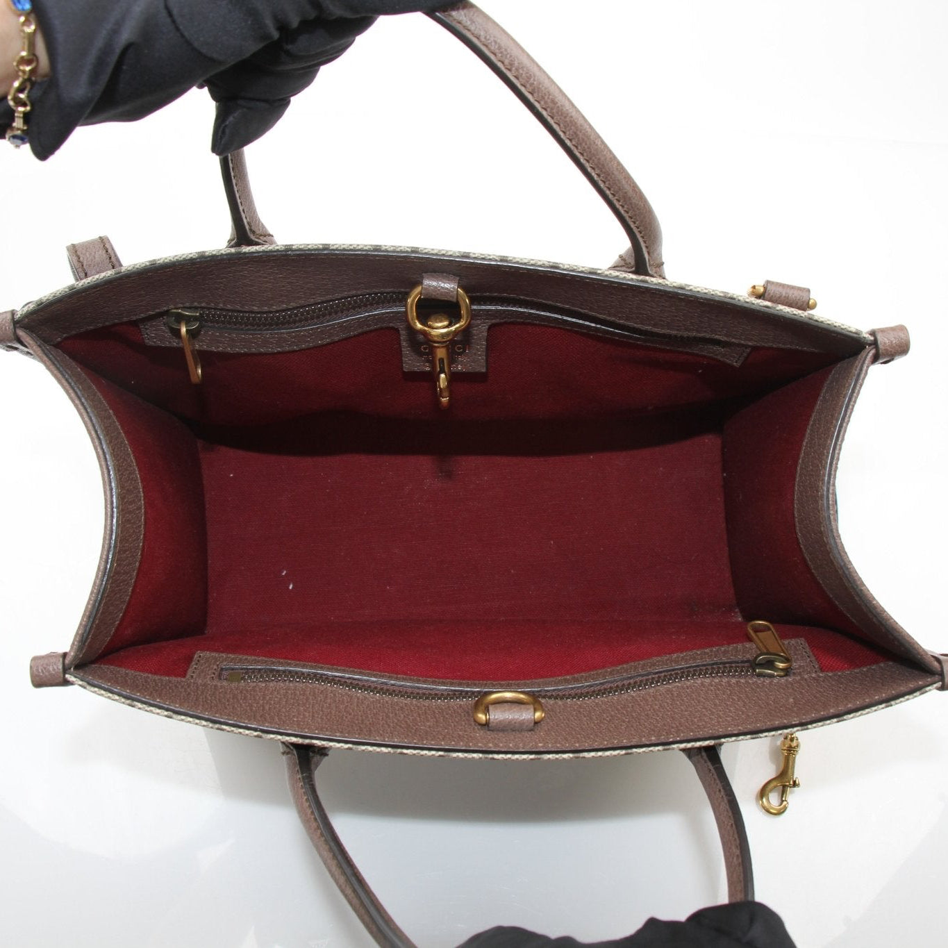 Gucci Disney Duck tote handbag by Gold & Beyond featuring a playful duck graphic on a stylish tote bag.