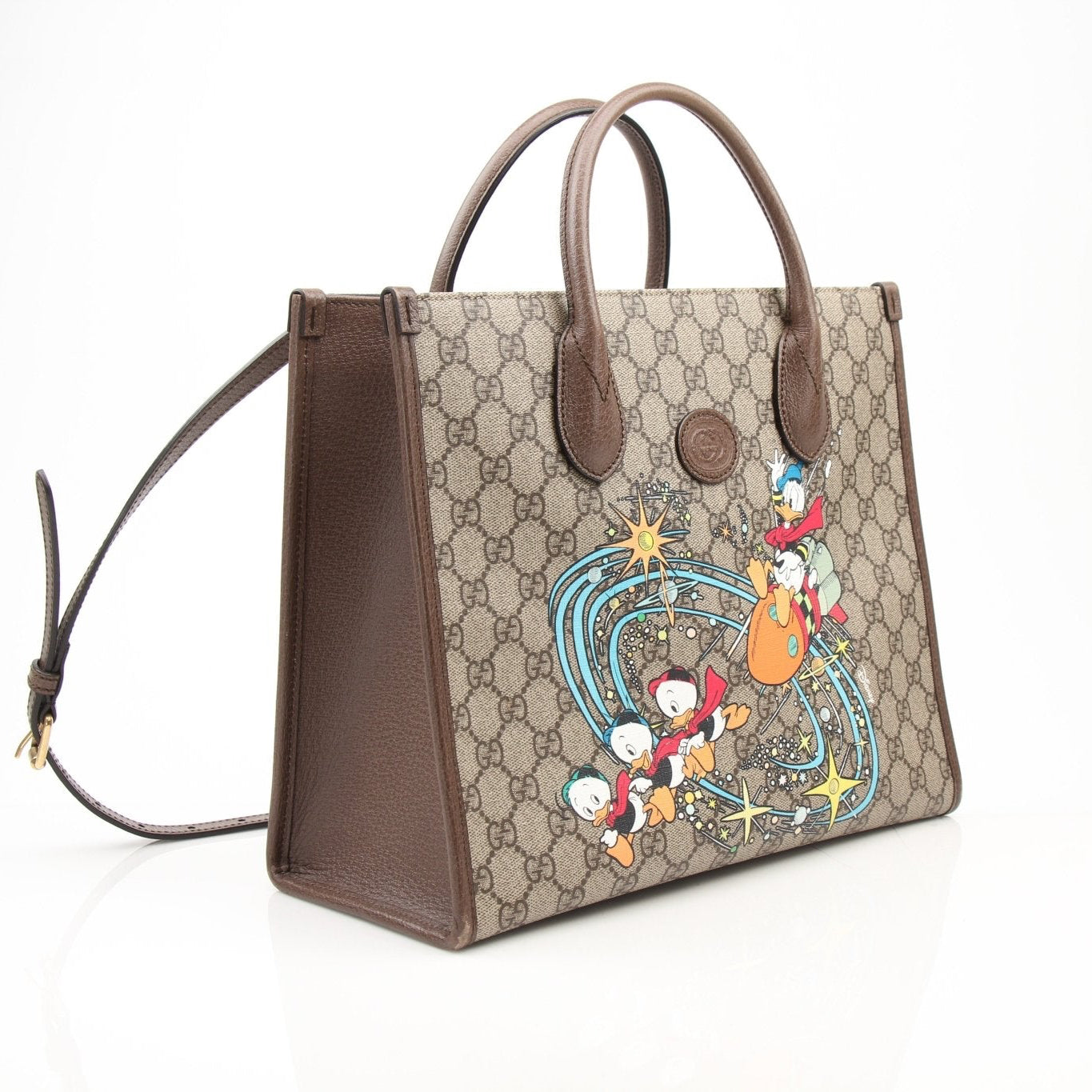Gucci Disney Duck tote handbag by Gold & Beyond featuring a playful duck design and spacious interior.