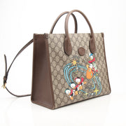 Gucci Disney Duck tote handbag by Gold & Beyond featuring a playful duck design and spacious interior.