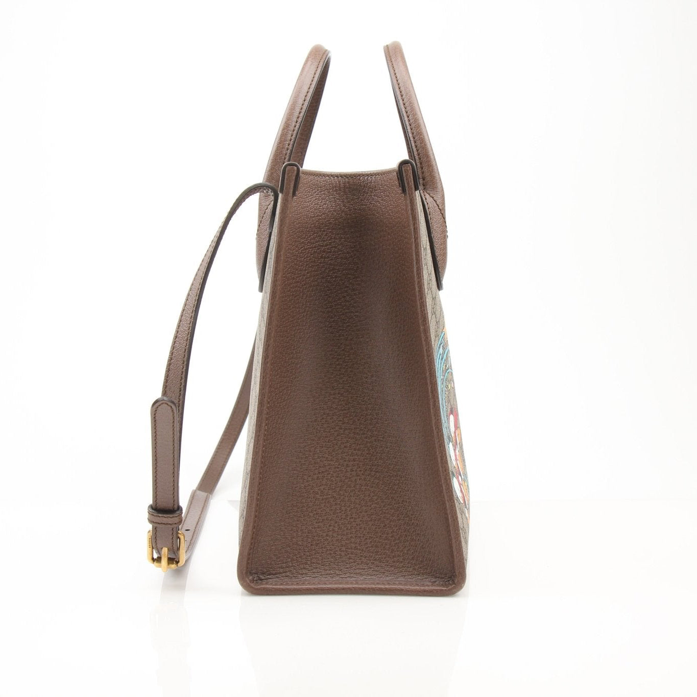 Gucci Disney Duck tote handbag with gold accents, featuring a playful duck design and spacious interior for everyday use.