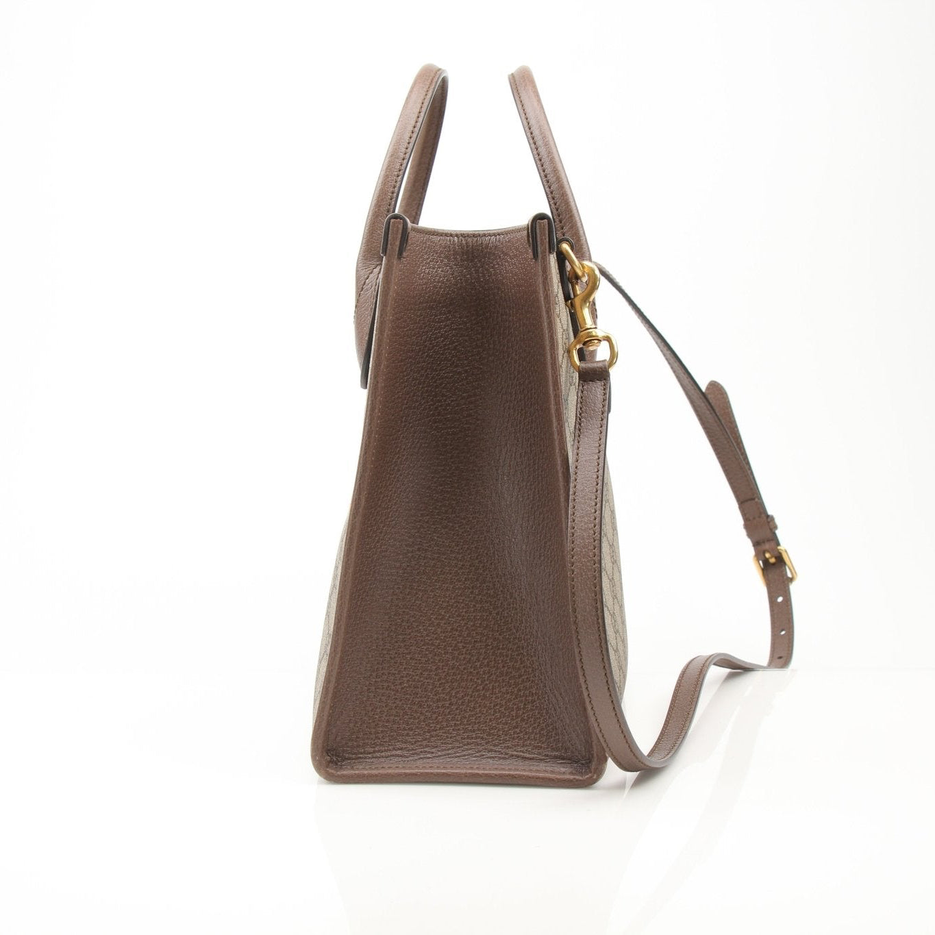 Gucci Disney Duck tote handbag with gold accents and adjustable straps, featuring a playful Disney duck design.