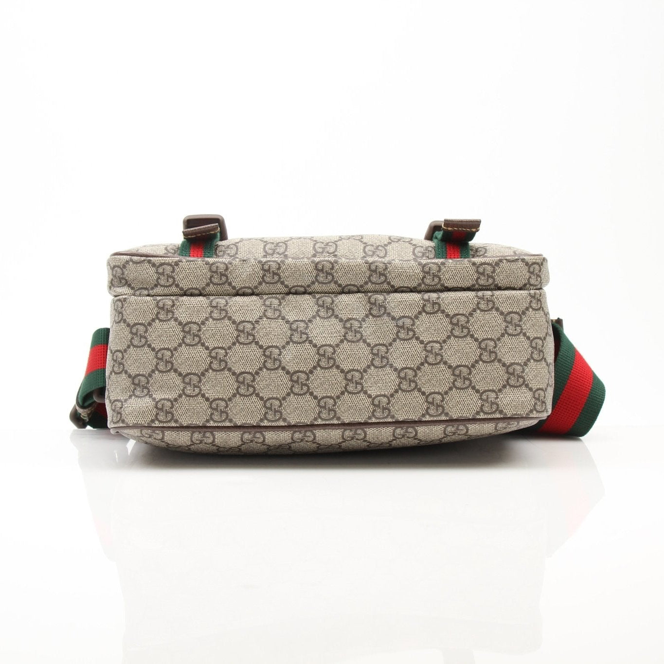 Gucci GG Supreme messenger handbag with adjustable strap and gold-tone hardware, featuring signature coated canvas and leather accents.