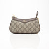 Gucci Ophidia GG Supreme Canvas Handbag featuring iconic logo and elegant design in a stylish image.