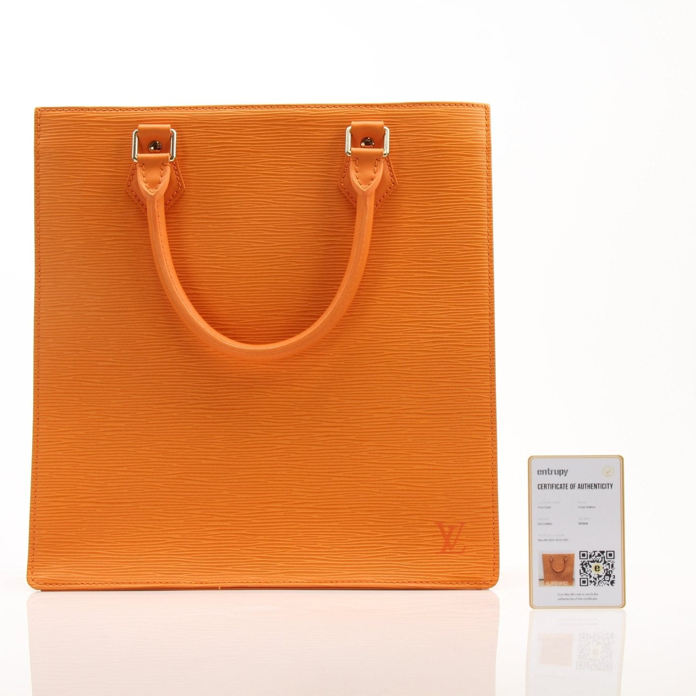 Louis Vuitton Epi Sac Plat leather tote bag by Gold & Beyond, featuring structured design and top handles in a close-up view.