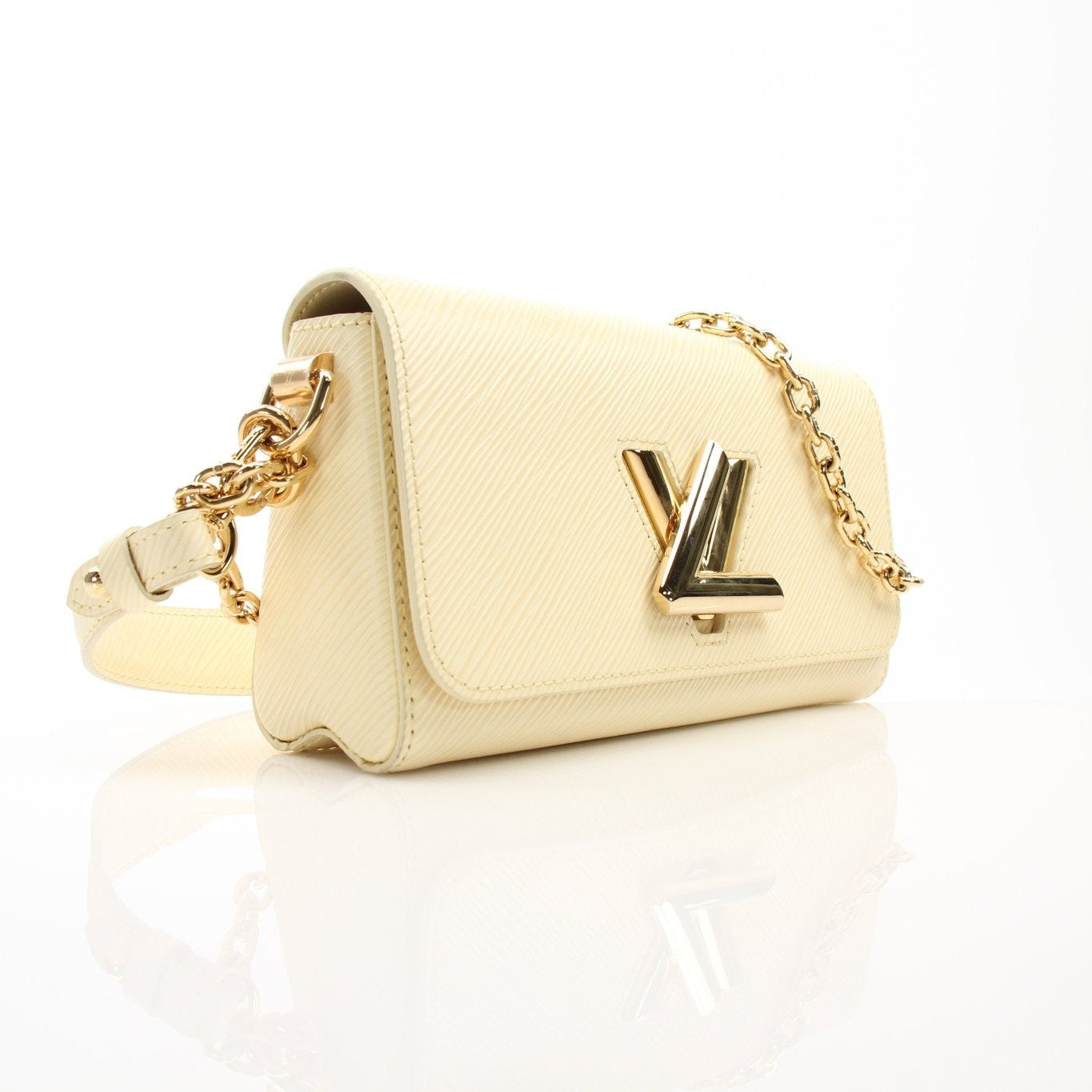 Louis Vuitton Ivory Twist West Chain Shoulder Bag, elegant handbag with gold chain detail, displayed on a neutral background.
