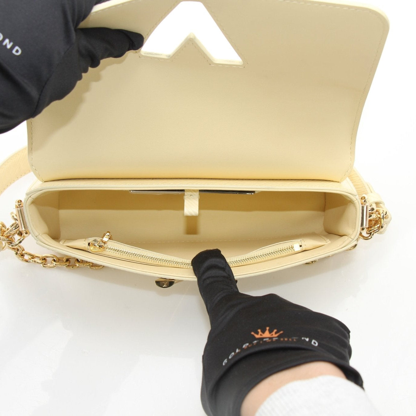Louis Vuitton Ivory Twist West Chain Shoulder Bag, elegant handbag with gold chain detail and signature LV design.