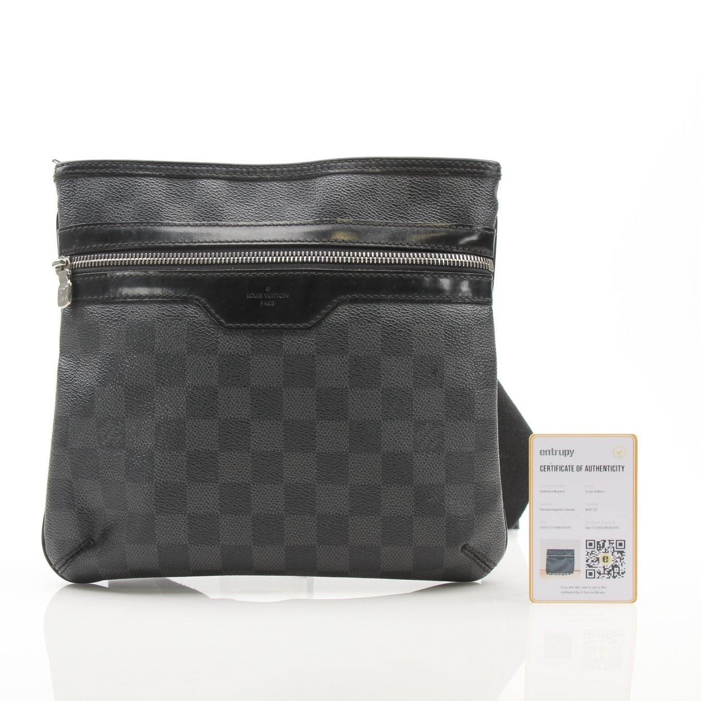 Gold & Beyond Louis Vuitton Thomas Messenger Bag handbag with leather strap and monogram design.