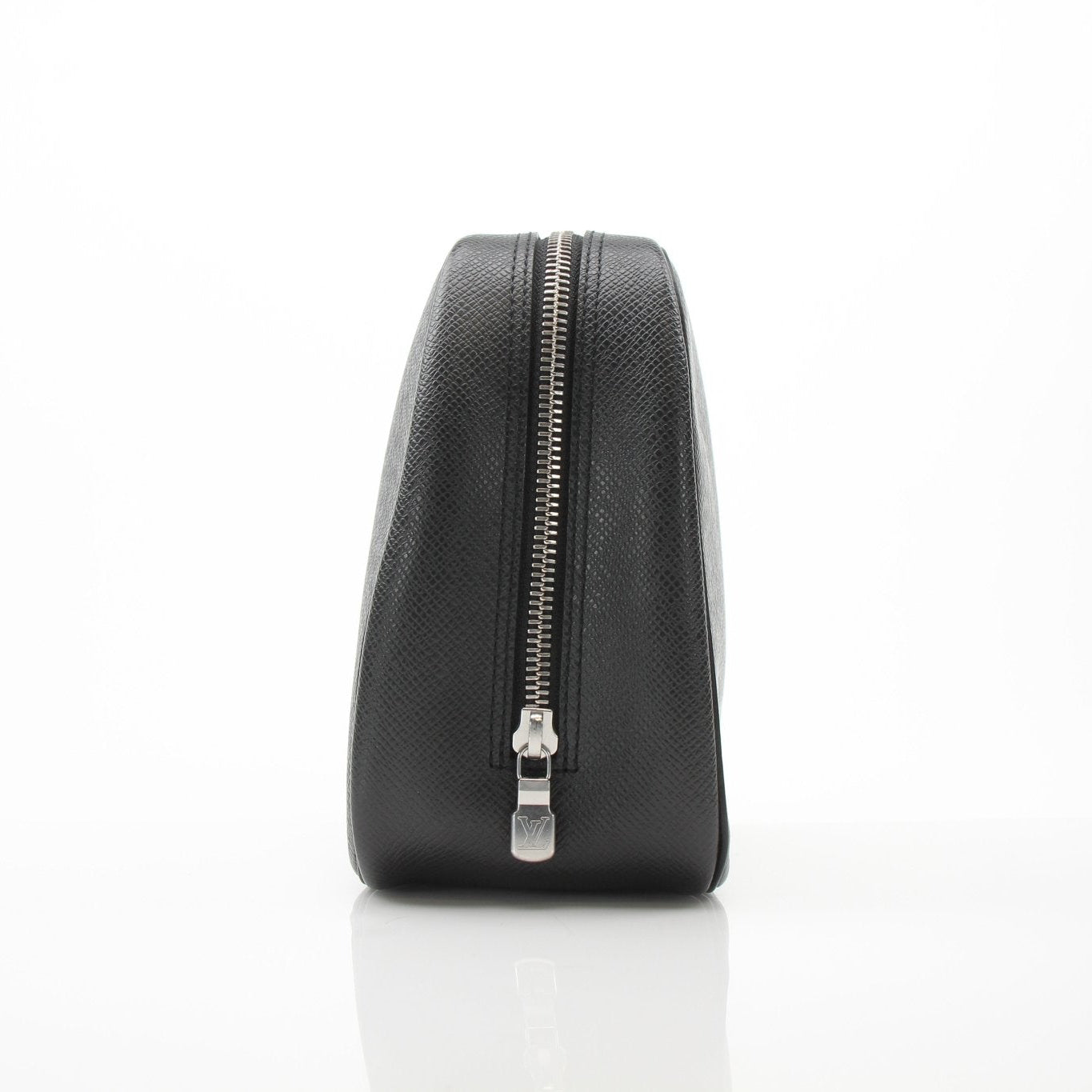 Louis Vuitton black zippy toiletry bag displayed as a vanity case with gold accents, showing its sleek design and compact size.