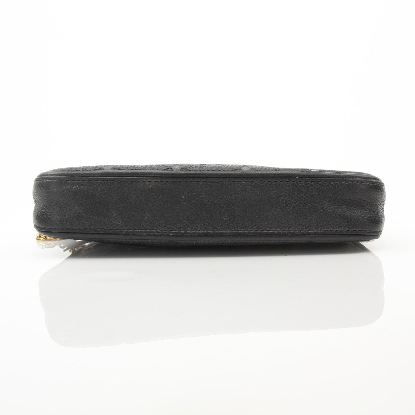 Louis Vuitton black Easy Pouch handbag on strap, featuring sleek design and gold accents, displayed on a plain background.