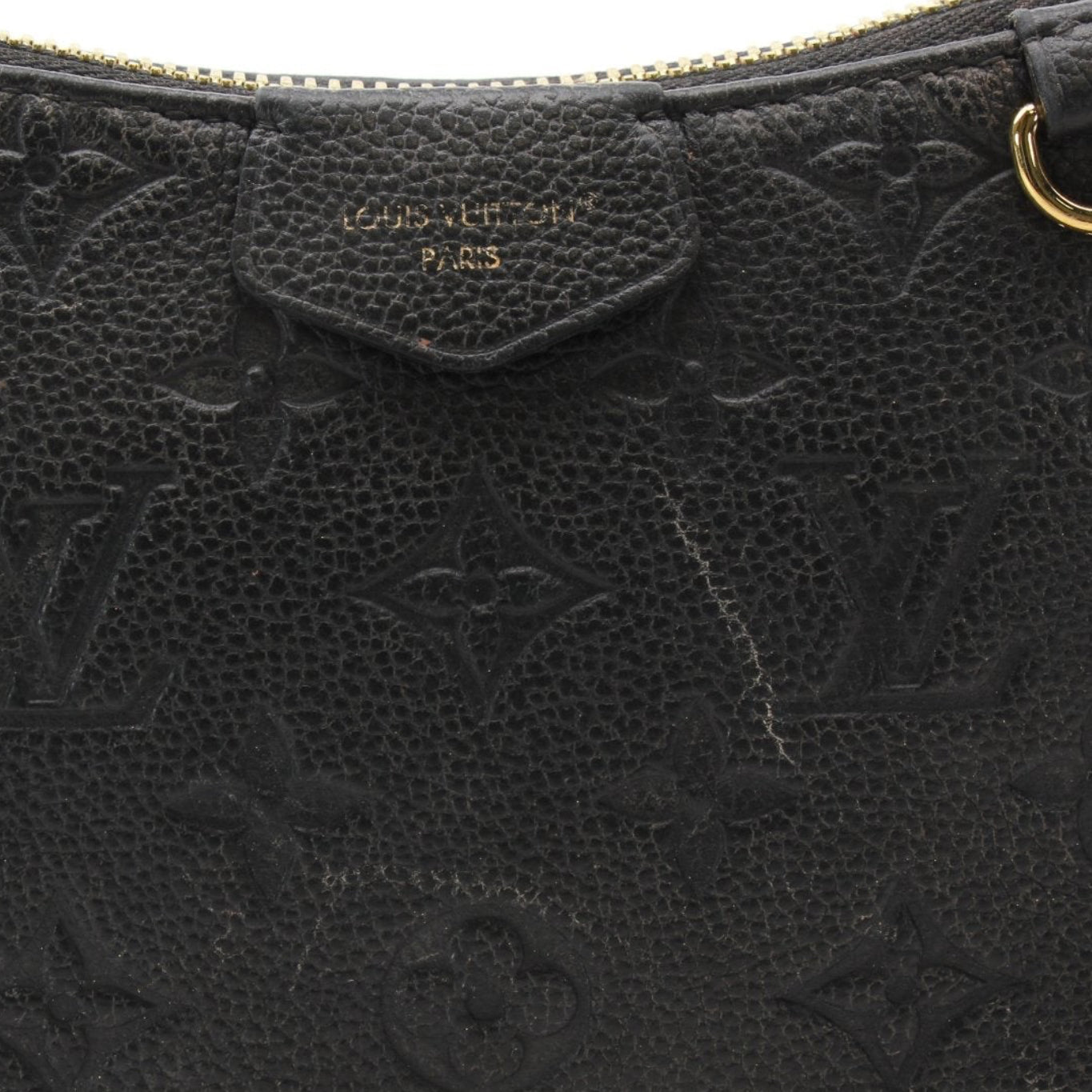 Louis Vuitton black Easy Pouch handbag with strap, stylish leather accessory from Gold & Beyond.