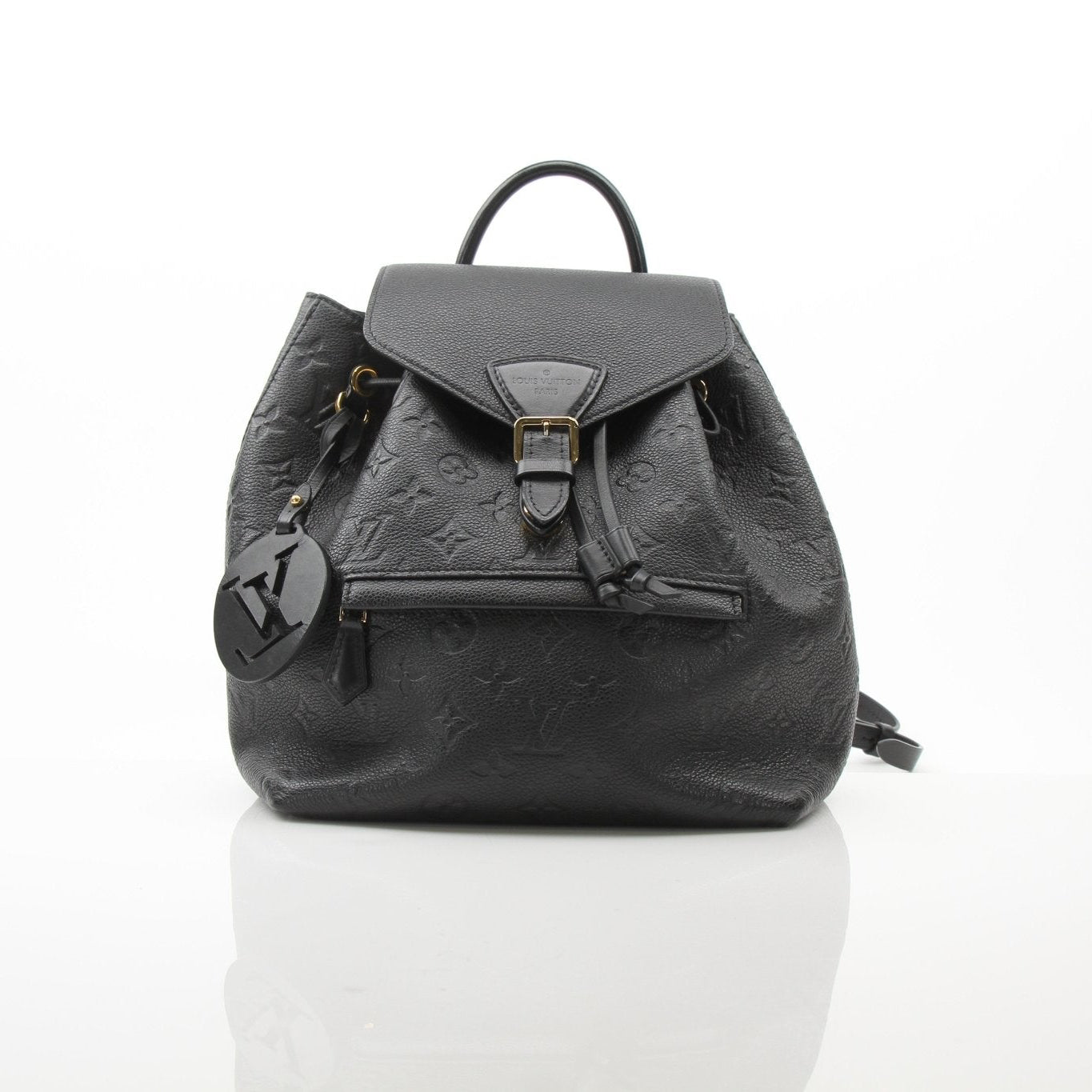 Gold & Beyond Louis Vuitton Mountsouris backpack, stylish travel bag with leather details and spacious interior.