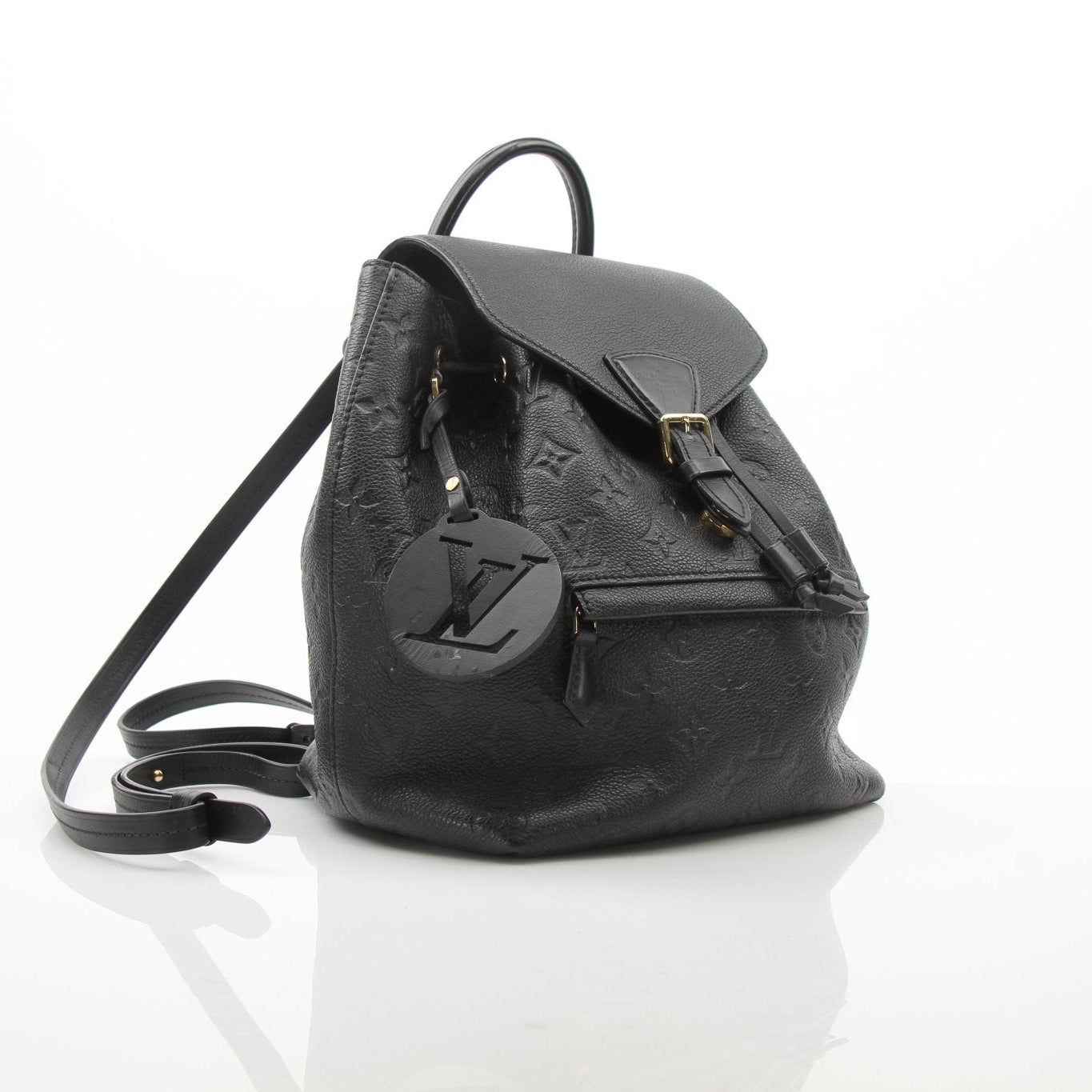 Gold & Beyond Louis Vuitton Mountsouris backpack, stylish travel bag with leather accents and spacious design, front view.
