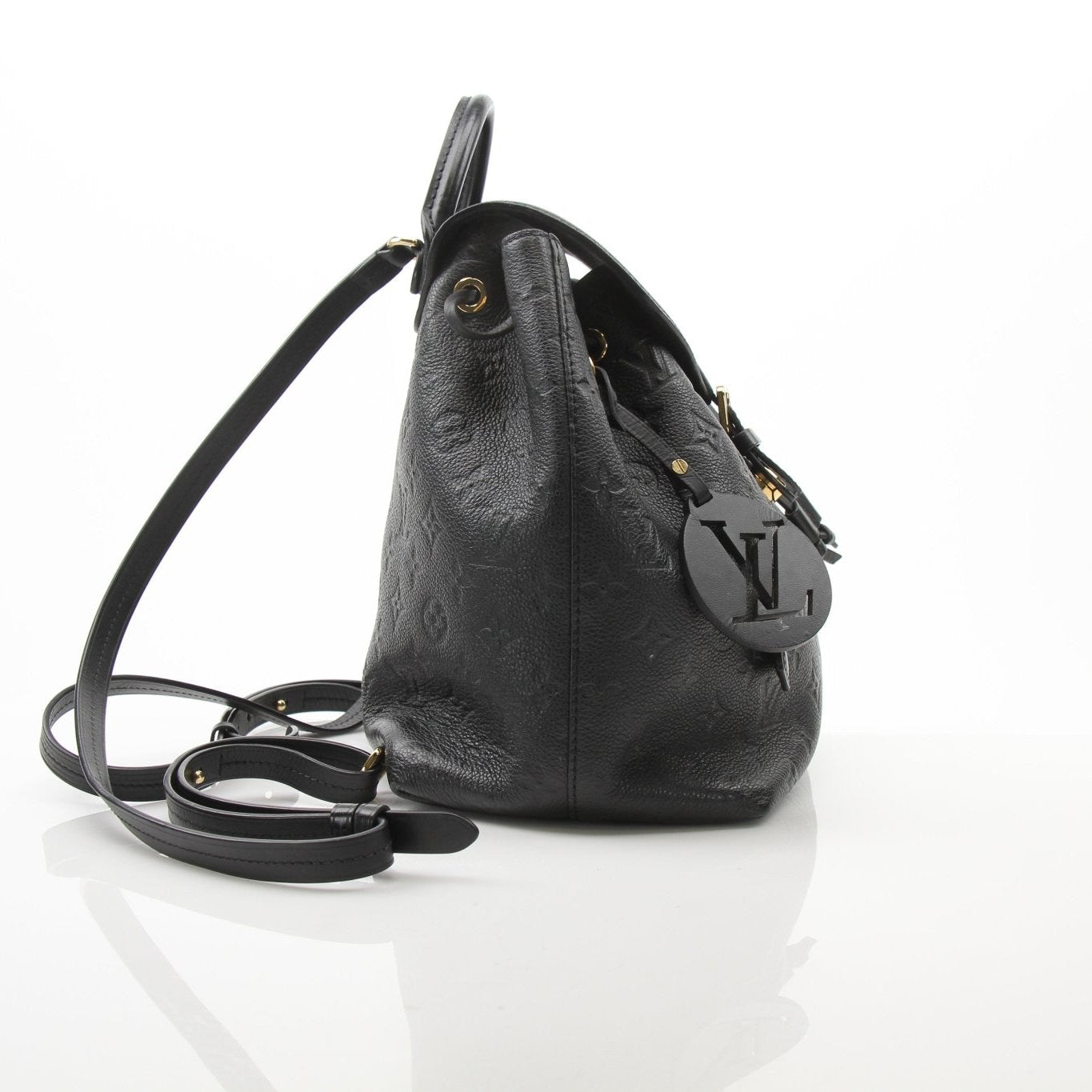 Gold & Beyond Louis Vuitton Mountsouris backpack, stylish travel bag with signature monogram canvas and leather details.
