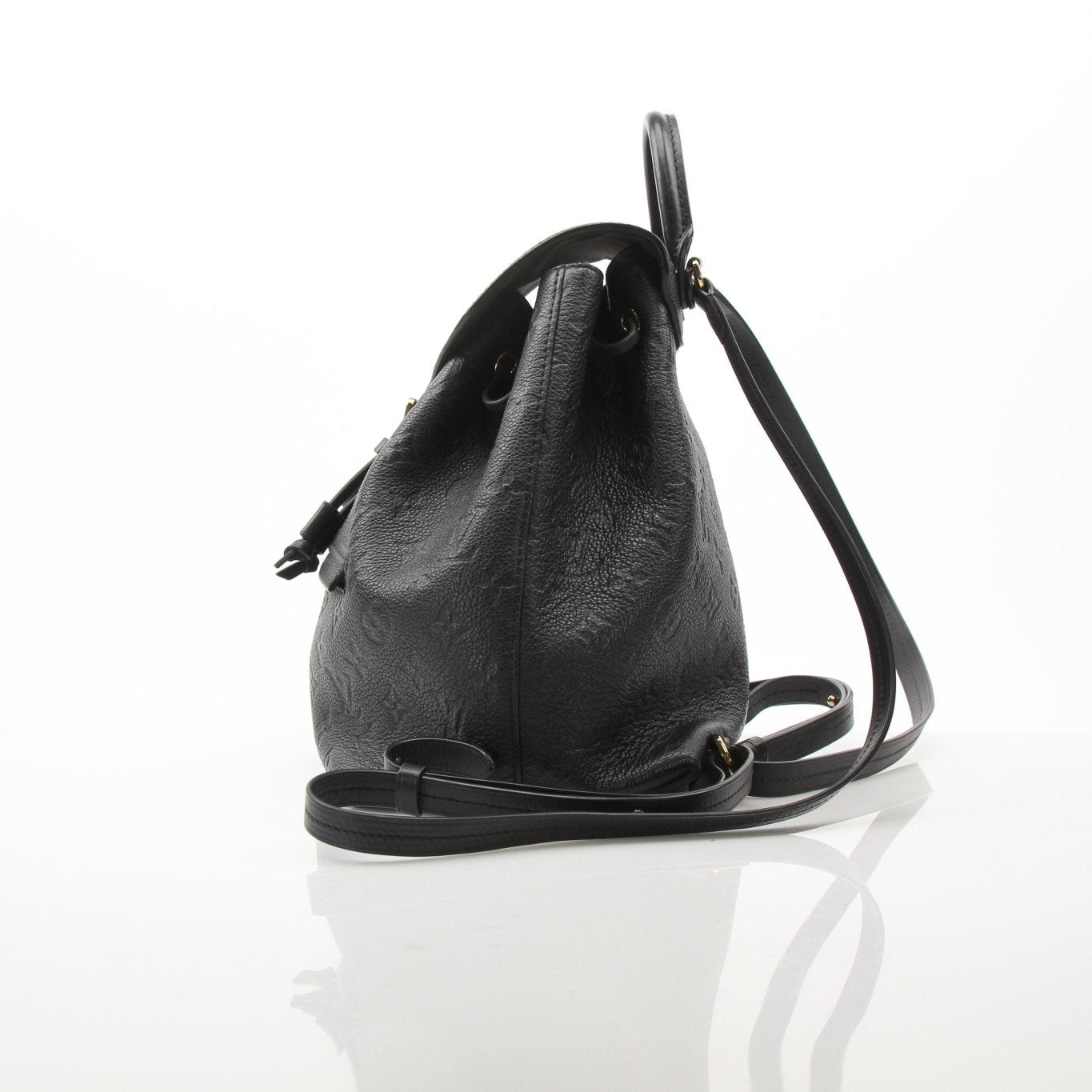 Louis Vuitton Mountsouris backpack, a stylish travel bag with leather accents and spacious compartments, by Gold & Beyond.