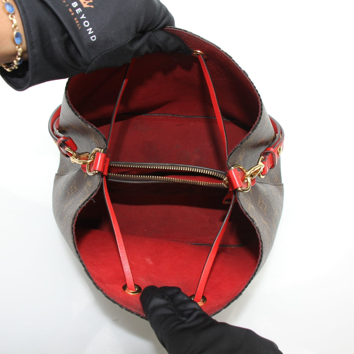 Louis Vuitton NéoNoé MM Monogram Coquelicot red bucket handbag with drawstring closure and shoulder strap