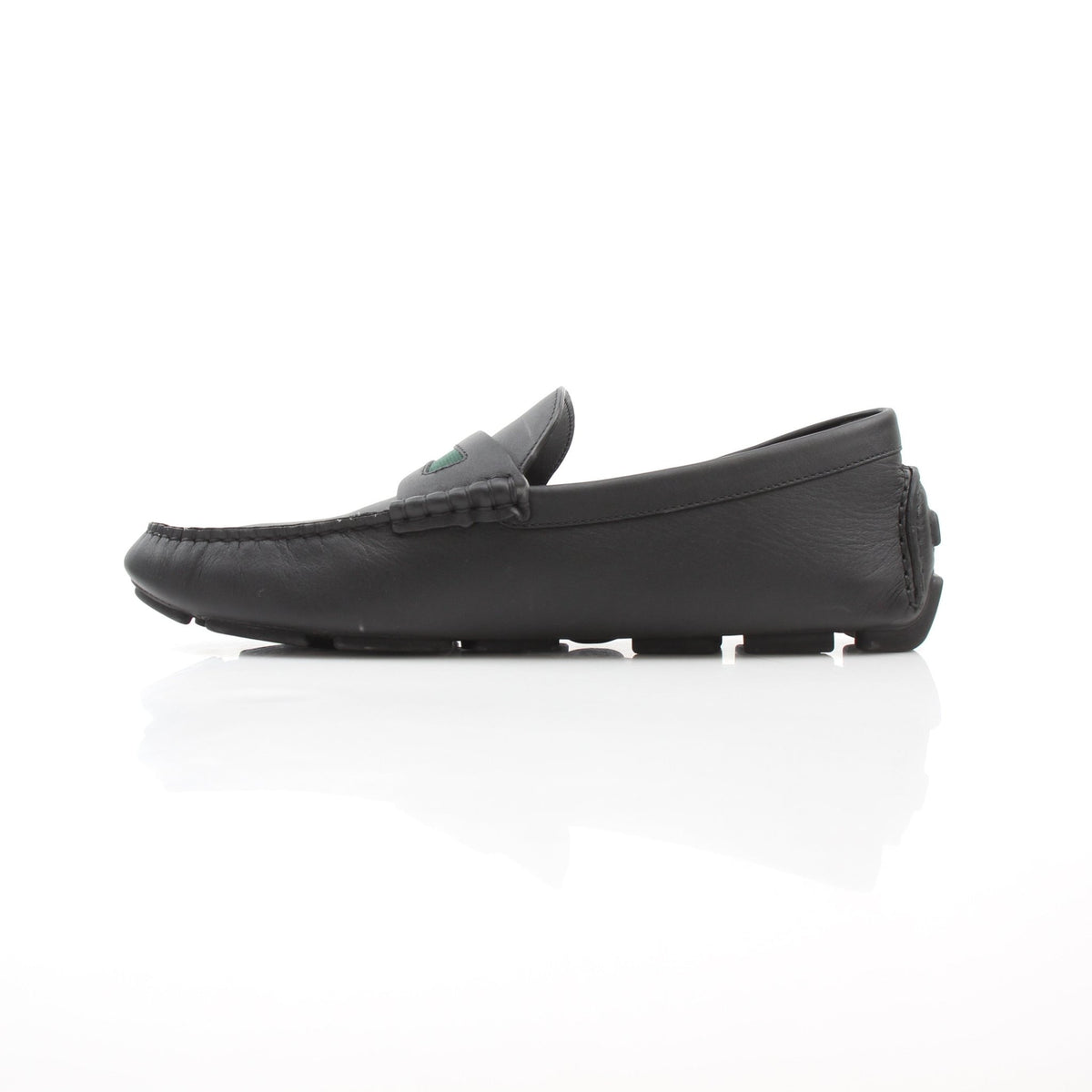 Gucci black leather driver loafers with Web detail, by Gold & Beyond
