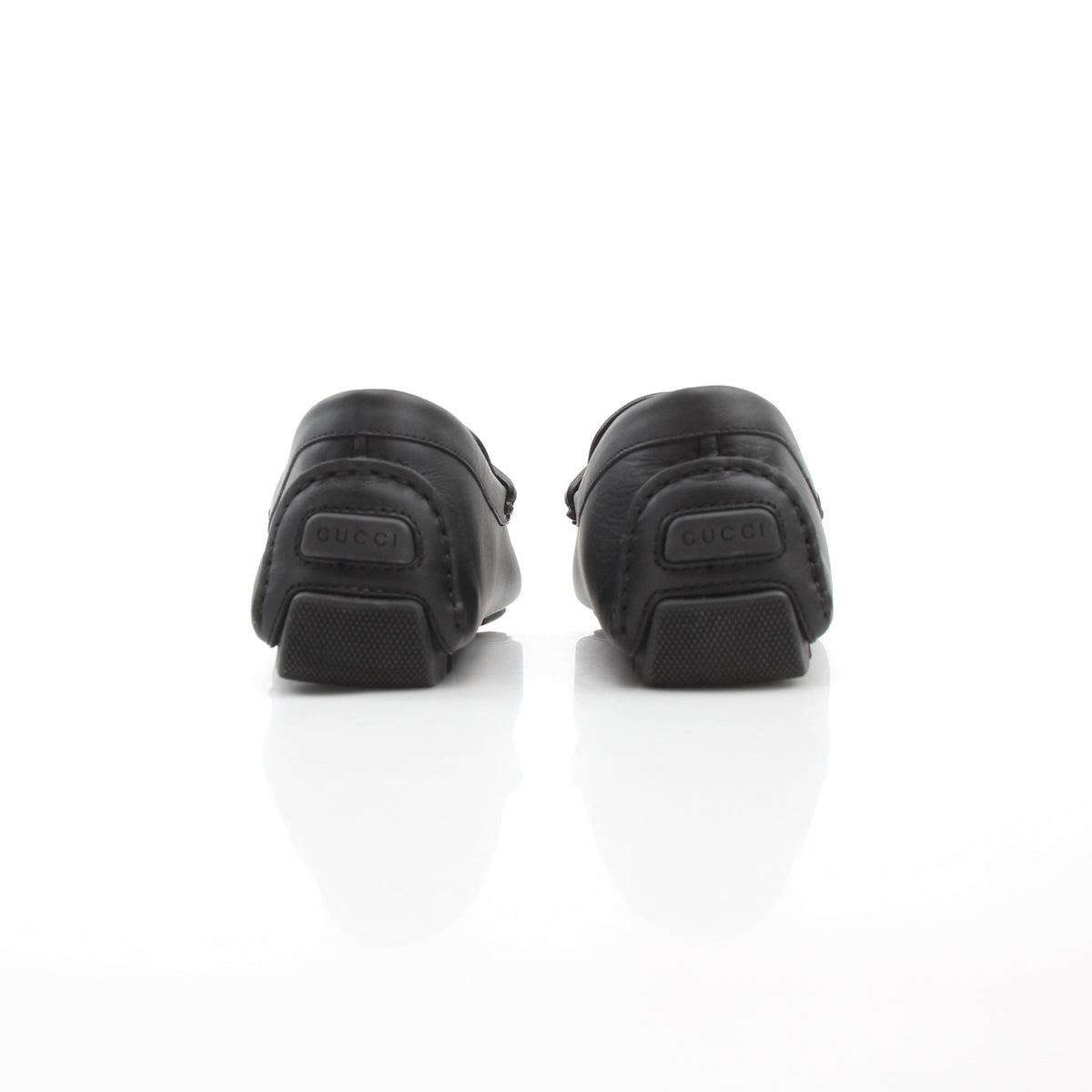 Gucci black leather driver loafers with web detail by Gold & Beyond