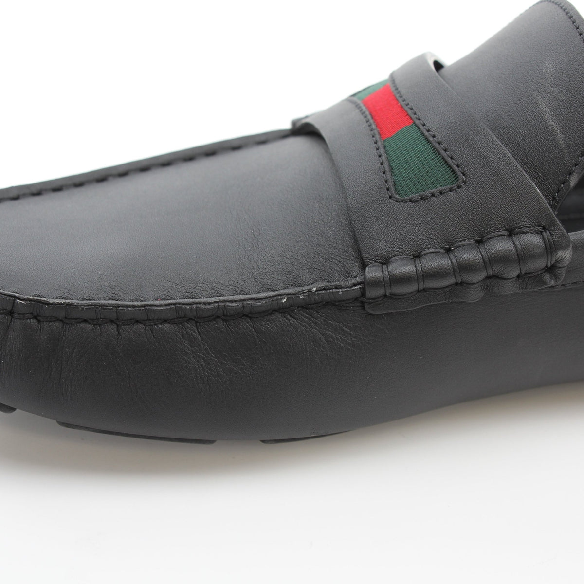 Black leather driver loafers with web detail by Gold & Beyond