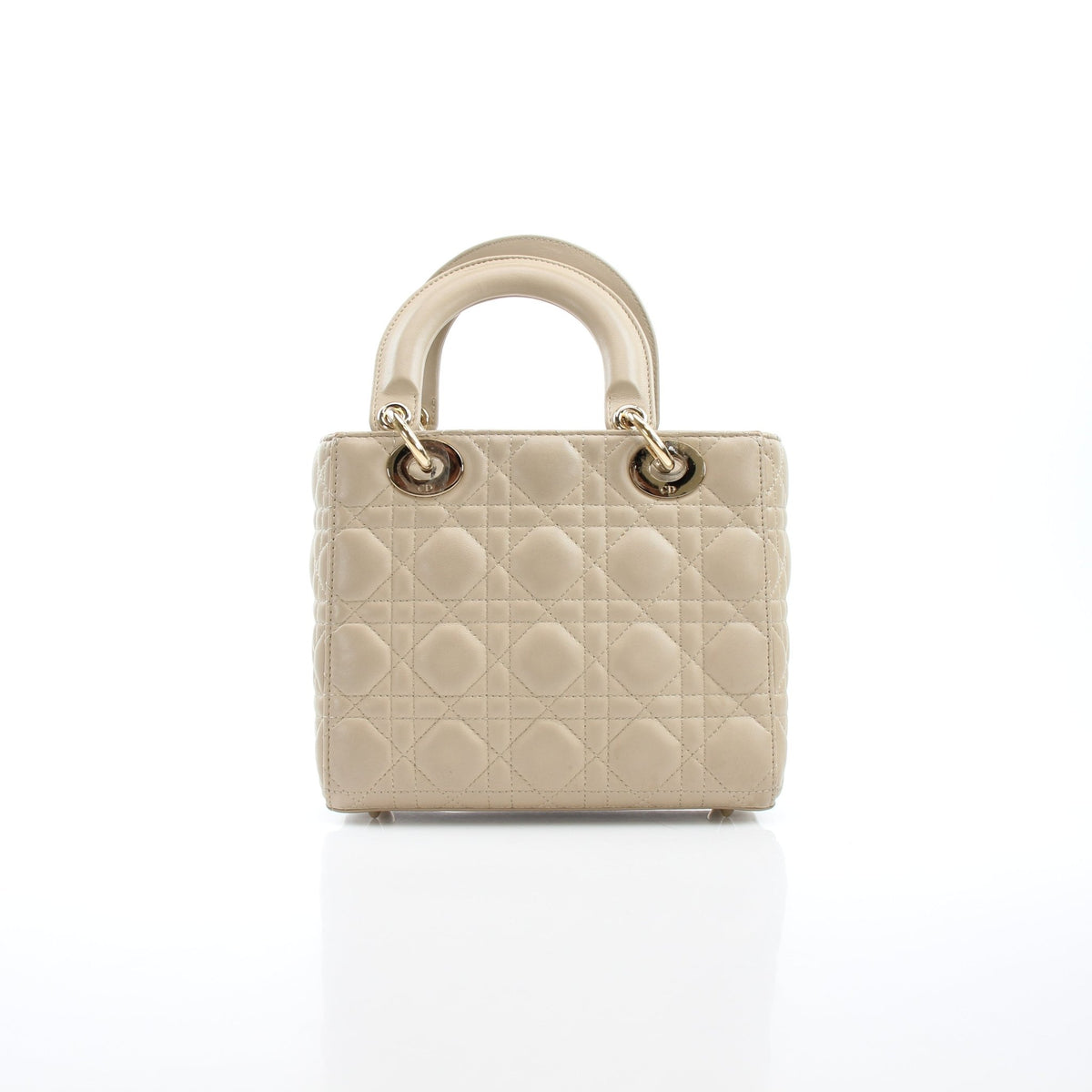 Medium beige Dior Lady Dior handbag with cannage lambskin, featuring gold hardware and structured design.