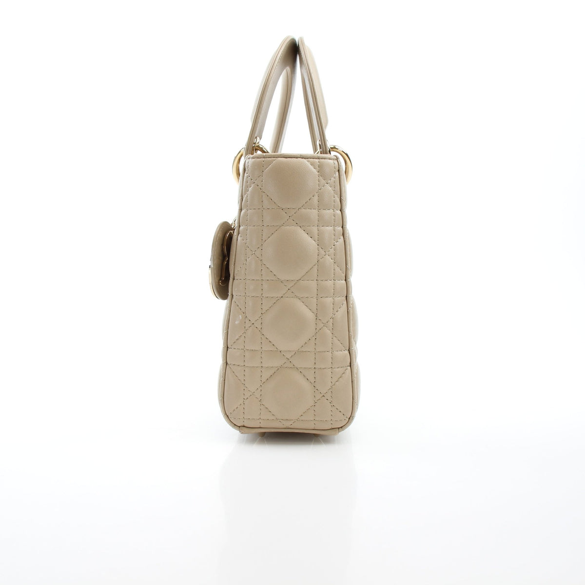 Beige Lady Dior medium handbag with cannage lambskin, featuring gold hardware and structured design by Dior.