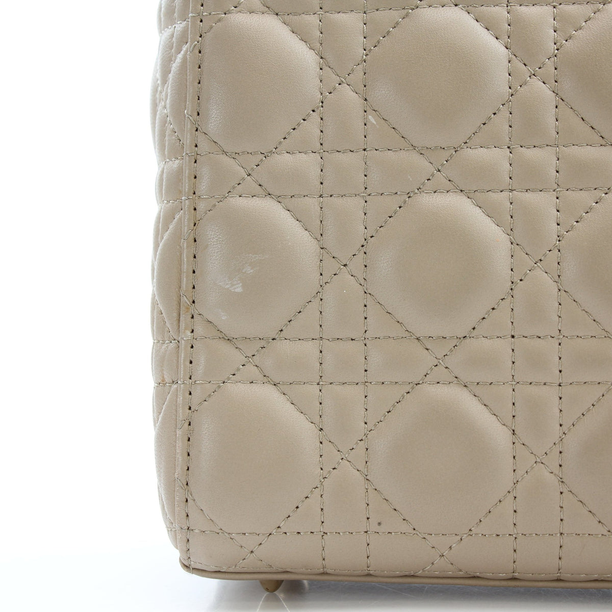 Beige Lady Dior medium handbag with cannage lambskin, featuring gold-tone hardware and top handles, by Dior.