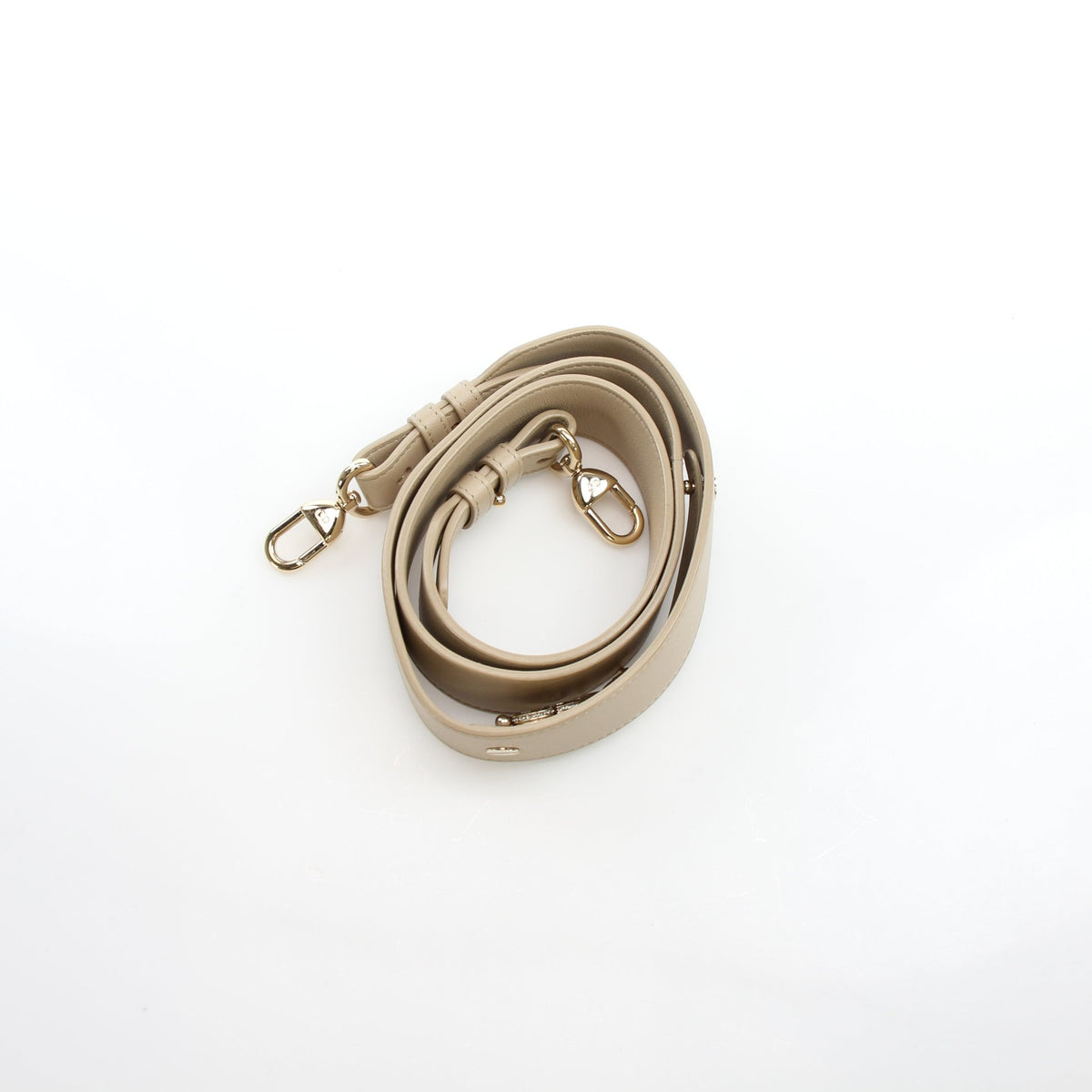 Medium beige Dior Lady Dior handbag with cannage lambskin leather and gold hardware, showcasing elegant craftsmanship.