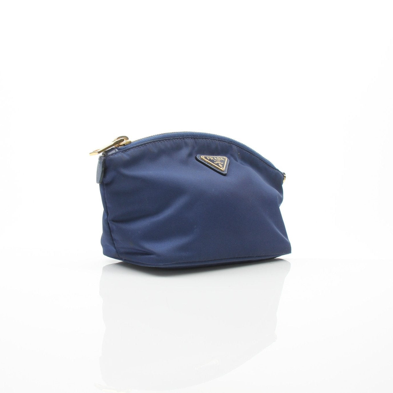 Prada navy blue Re-Nylon cosmetic mini pouch vanity case with zipper and compact design.