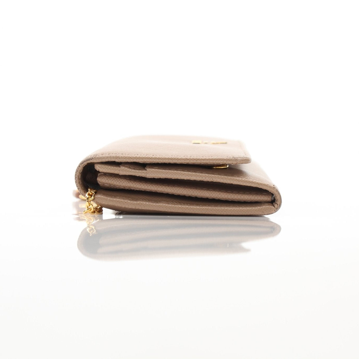 Beige Prada Saffiano Lux continental flap wallet with gold hardware, featuring a sleek design and textured leather finish.