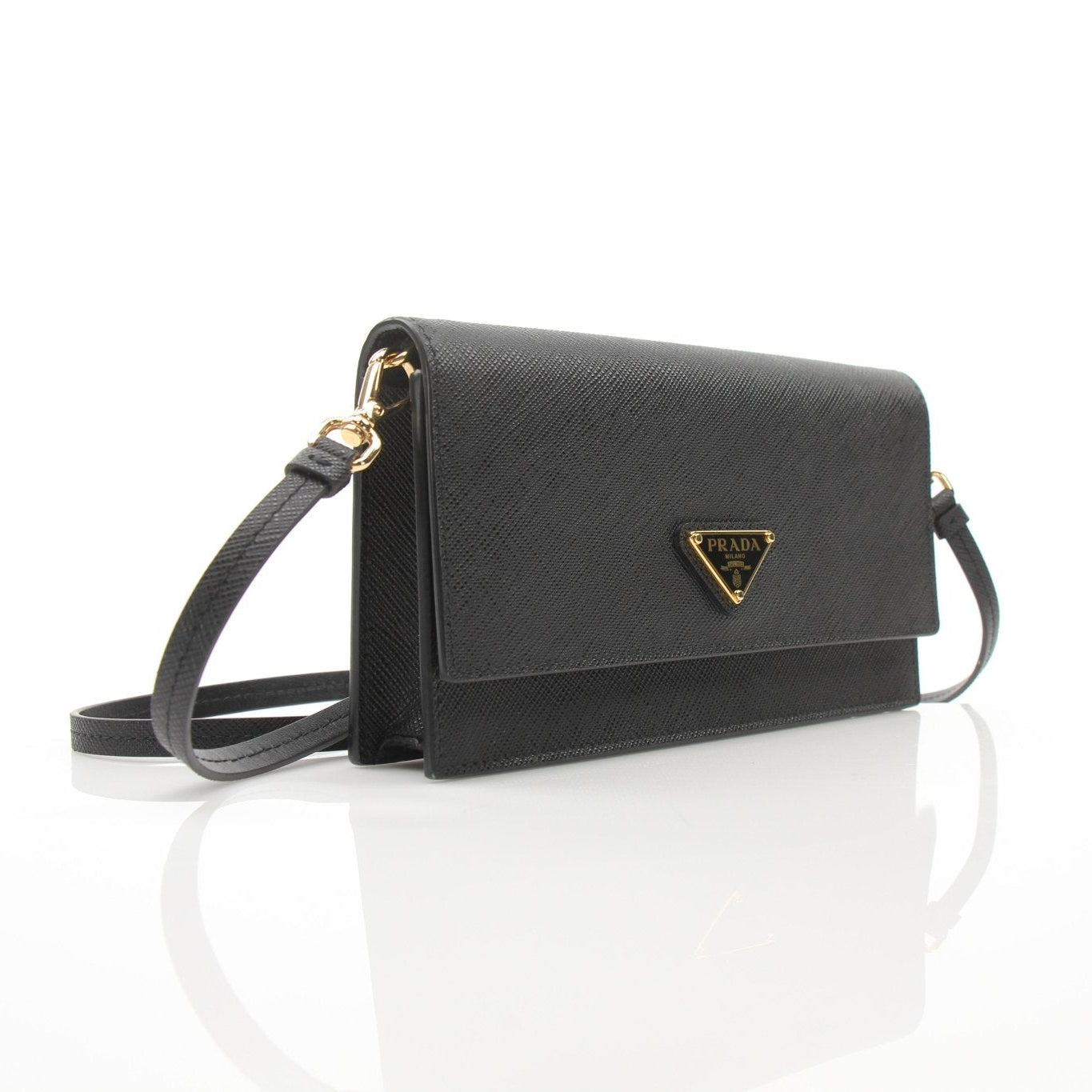 Gold & Beyond Prada Mini Crossbody Bag handbag with sleek design and gold-tone hardware, displayed on a plain background.