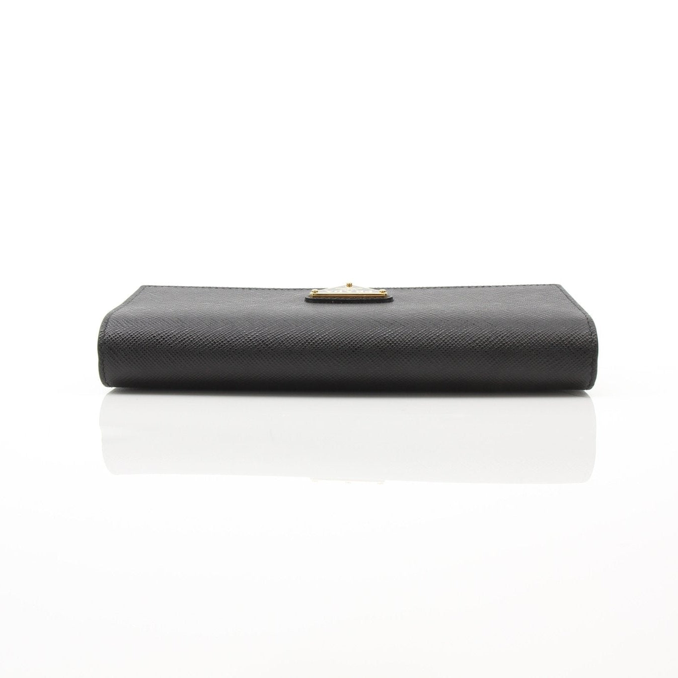 Gold & Beyond Prada Mini Crossbody Bag, stylish handbag with sleek design and adjustable strap, visible in the image.