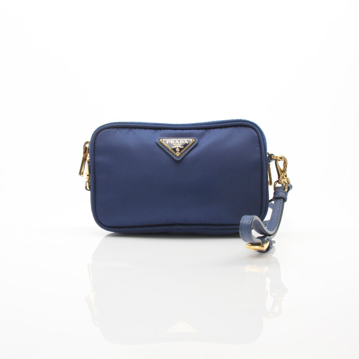 Prada blue nylon crossbody handbag with adjustable strap and gold hardware, stylish and functional for everyday use.