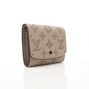 Gold & Beyond Louis Vuitton Iris Compact Wallet with gold accents, featuring a sleek design and multiple card slots.