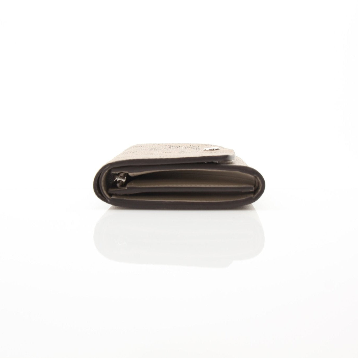 Gold & Beyond Louis Vuitton Iris compact wallet with sleek design, showcasing the luxurious leather and silver hardware.