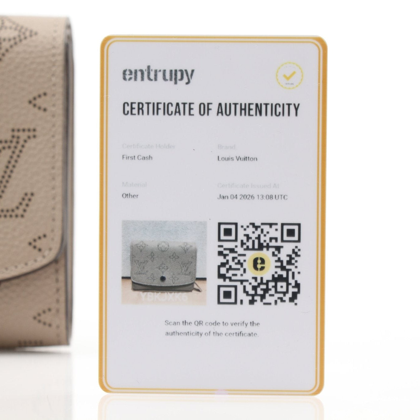 Louis Vuitton Iris compact wallet by Gold & Beyond, featuring sleek design and premium materials, shown in a close-up image.