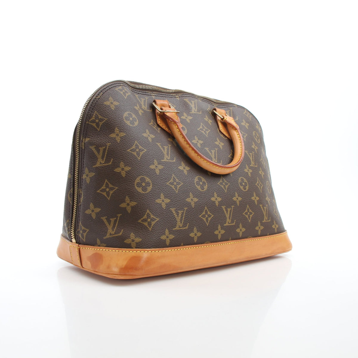 Louis Vuitton Monogram Alma PM handbag in brown coated canvas with top handles and gold-tone hardware.