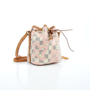 Louis Vuitton Damier Azur Tahitienne Nano Noé handbag with gold-tone hardware and leather strap on a neutral background.