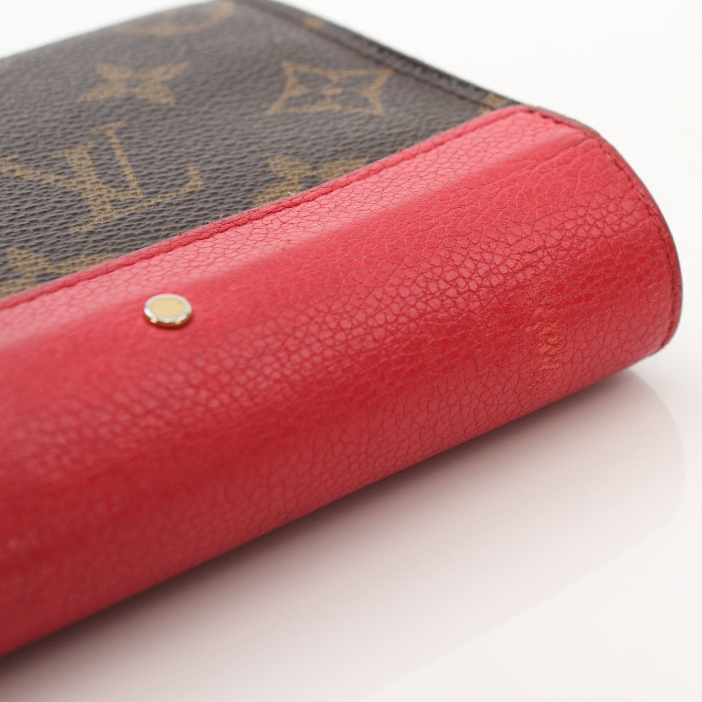 Louis Vuitton Pallas long wallet by Gold & Beyond, featuring luxurious leather and multiple card slots, displayed on a neutral background.